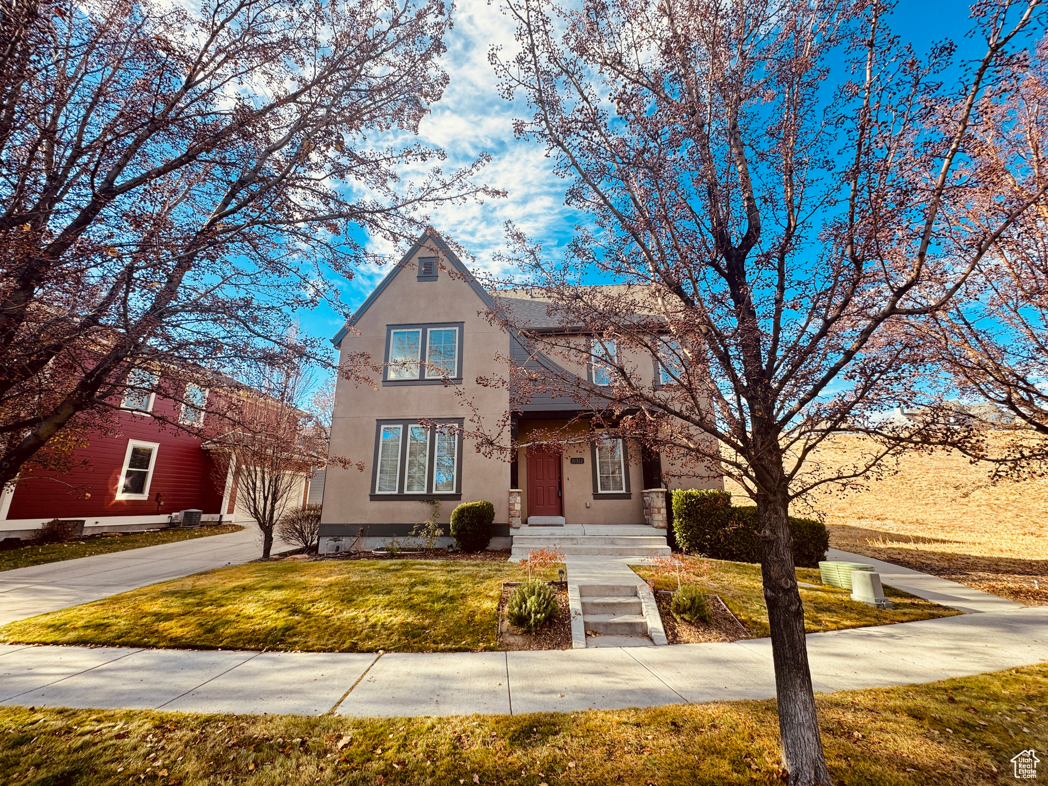 View of front of property with a front yard