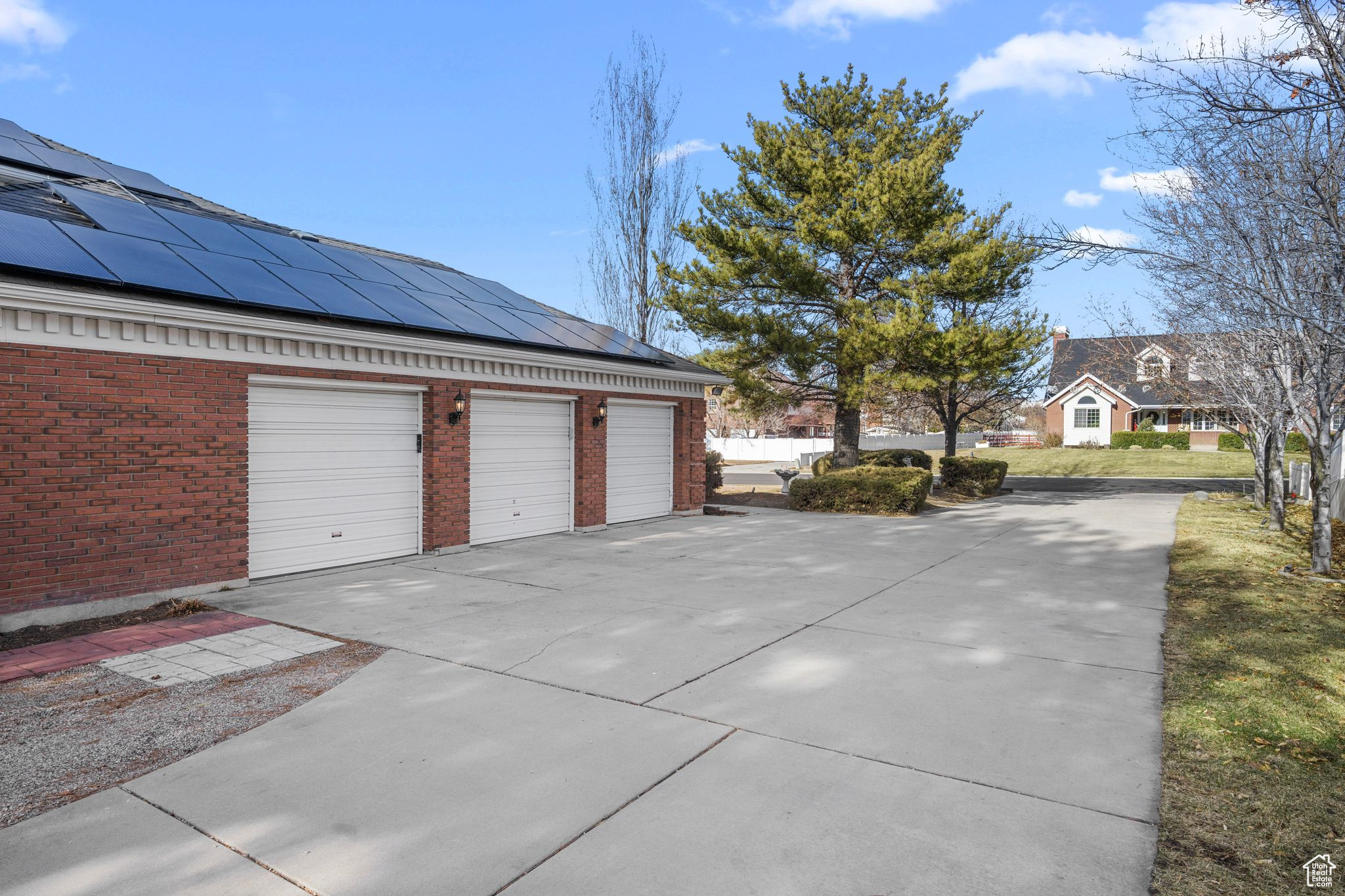 3 Car attached Garage with solar panels