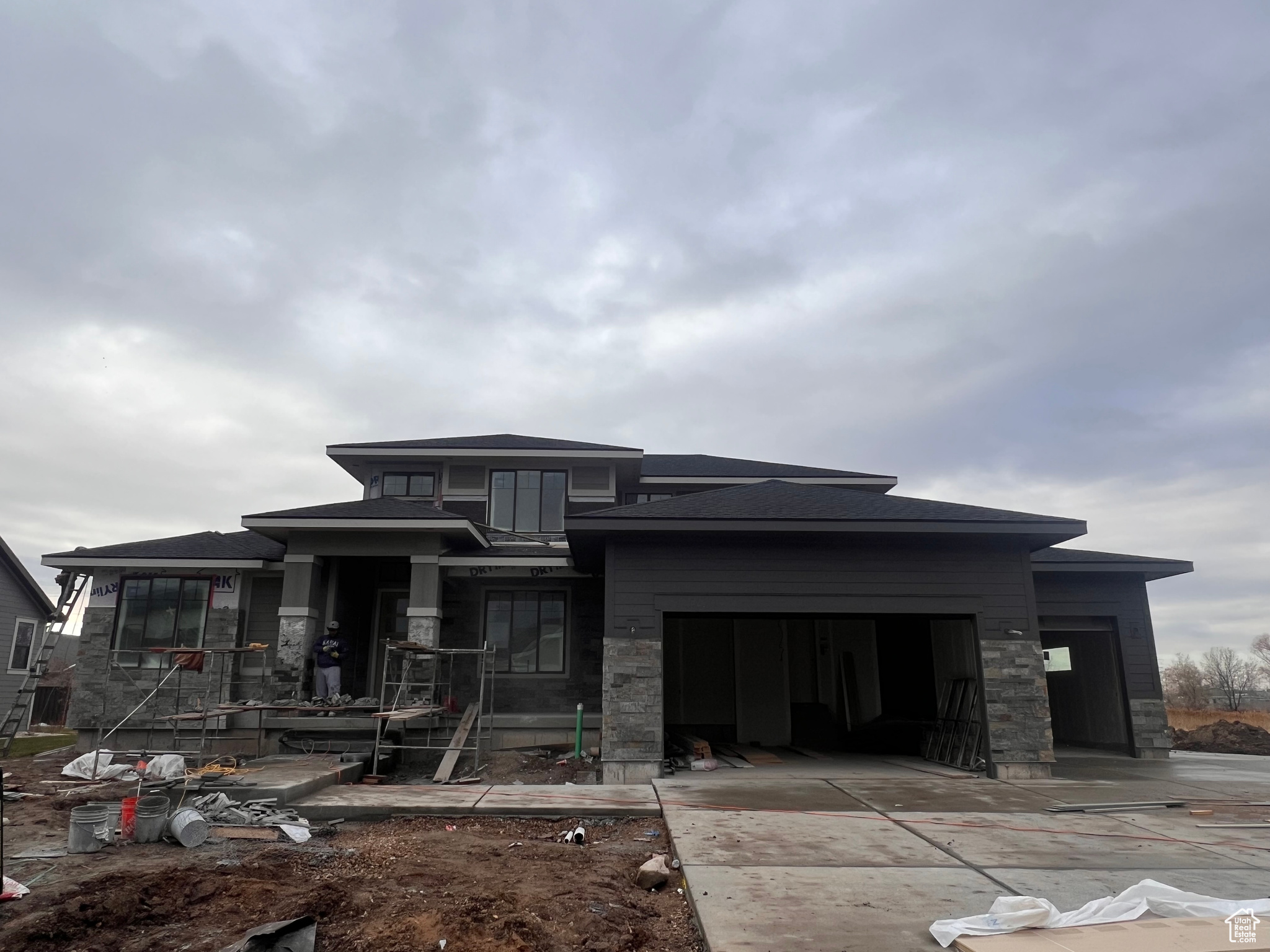 Prairie-style home with a garage