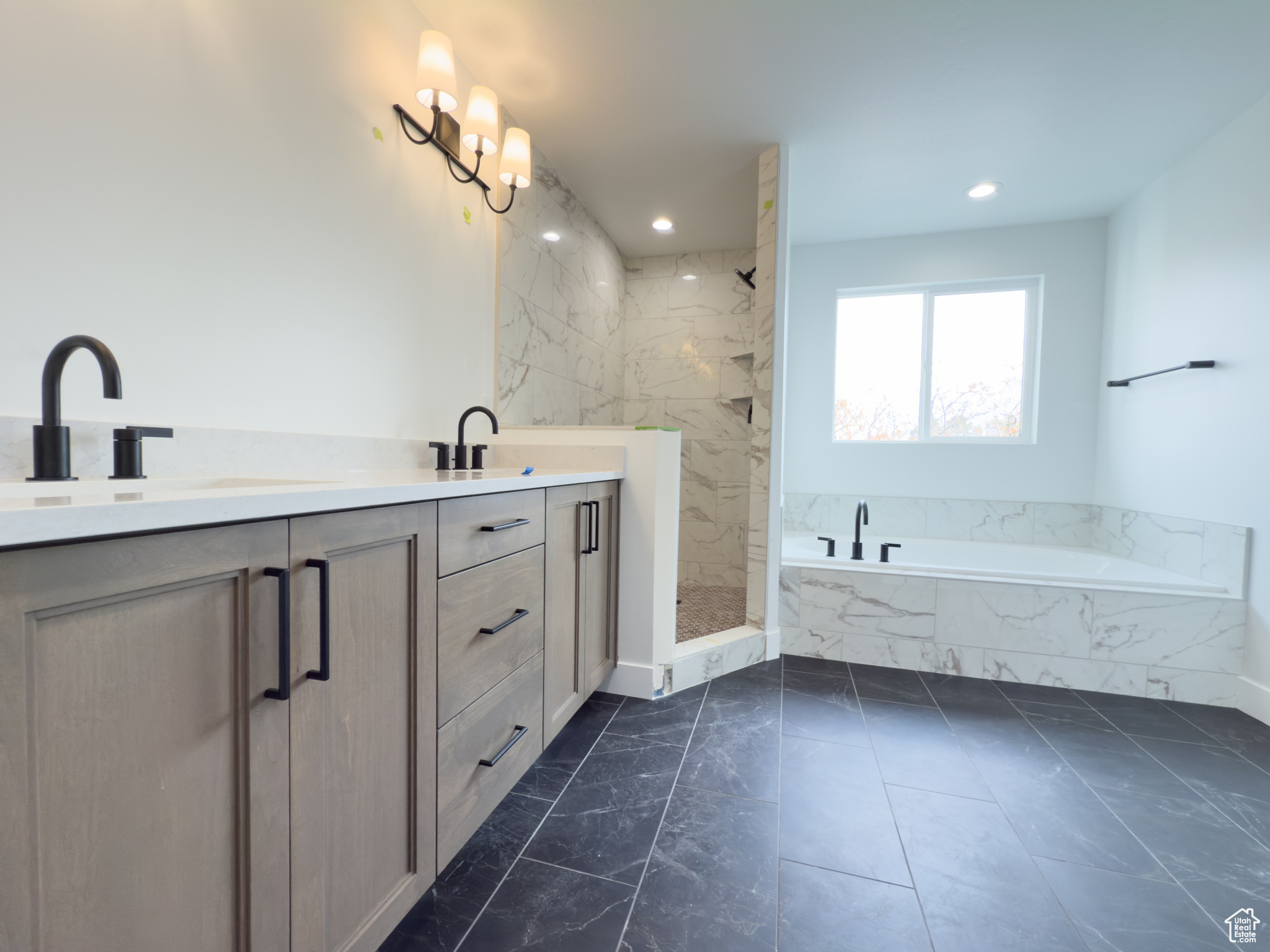 Bathroom with plus walk in shower and vanity