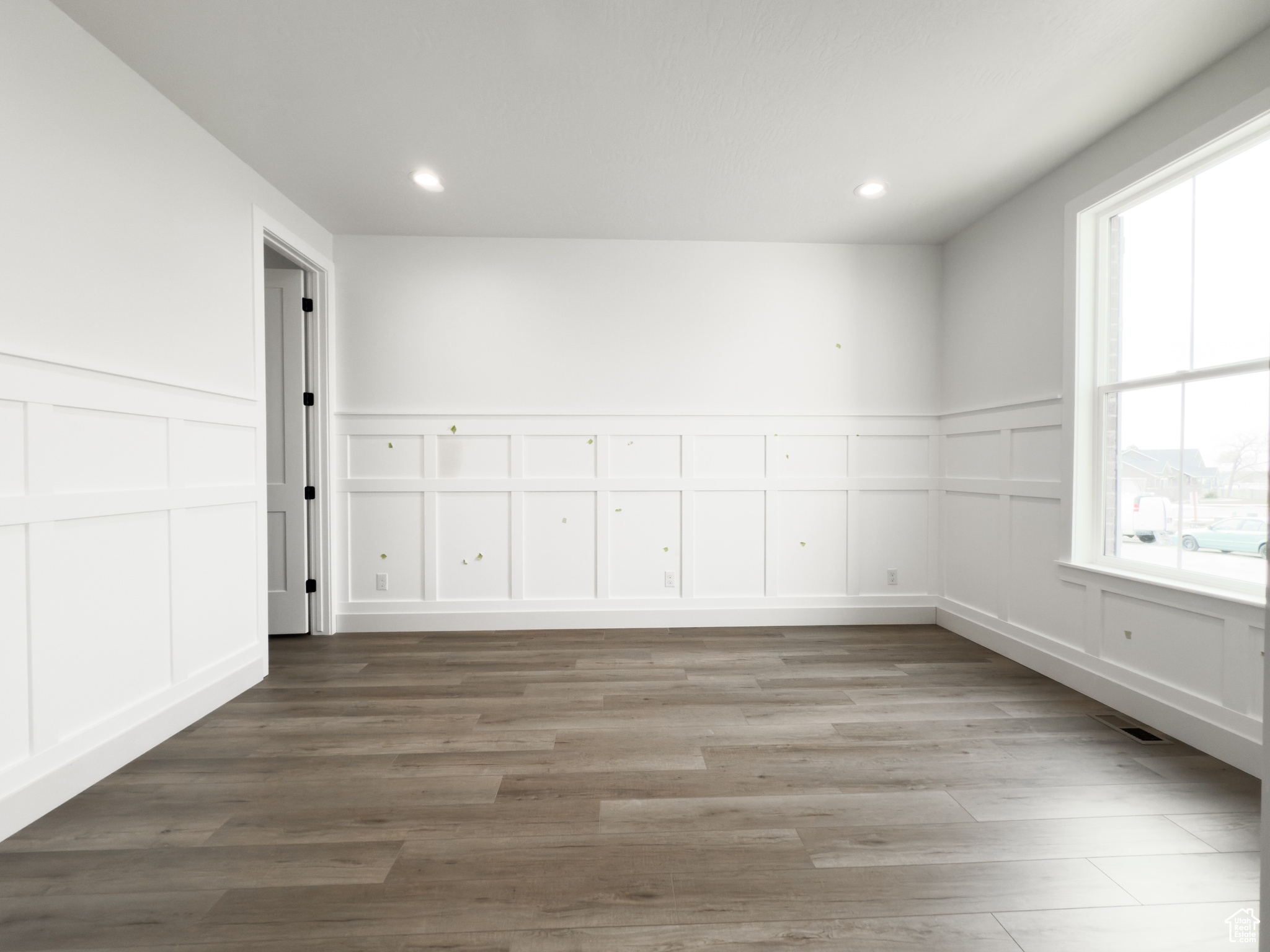 Unfurnished room featuring hardwood / wood-style floors