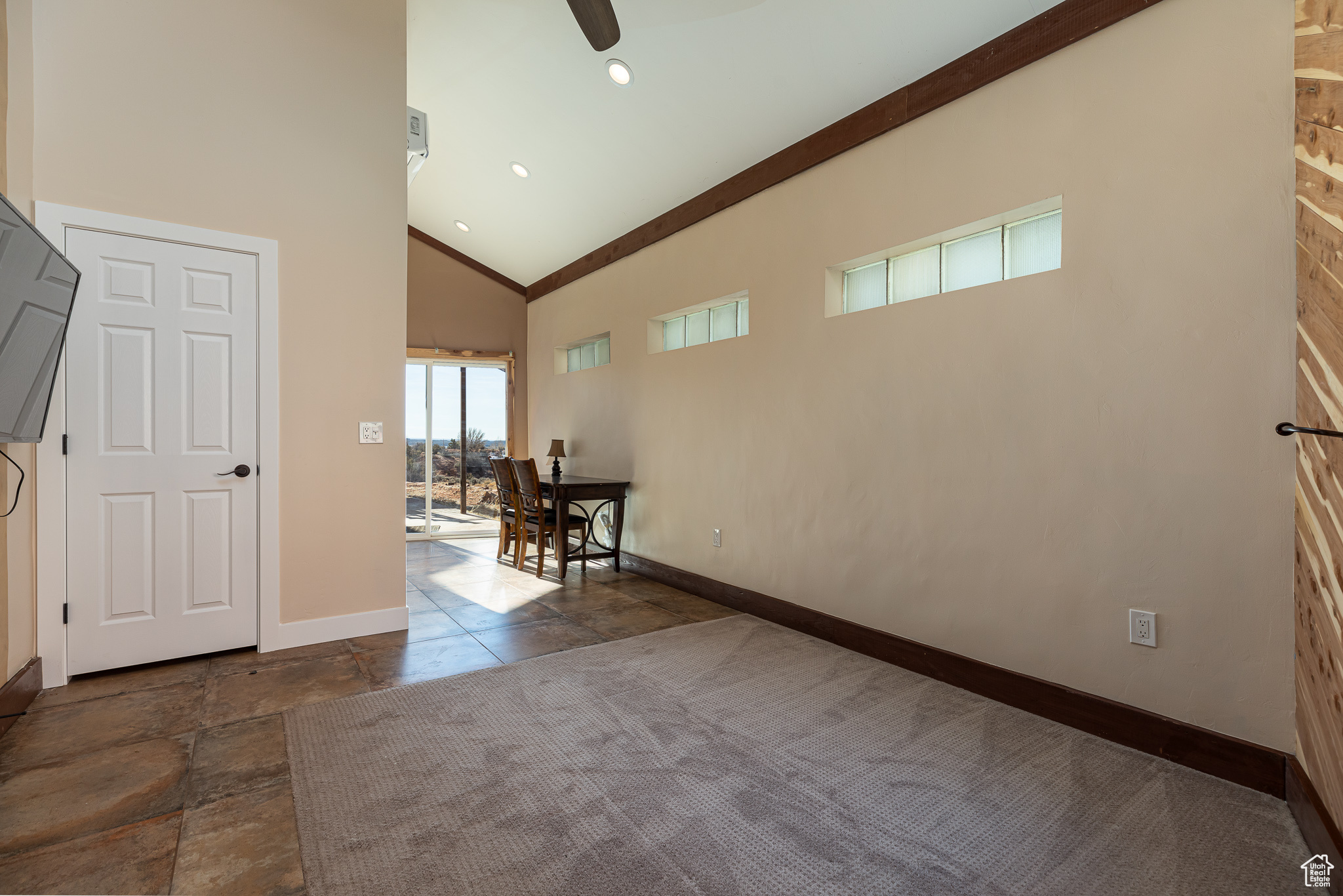 Master bedroom #3 with high vaulted ceiling with ceiling fan