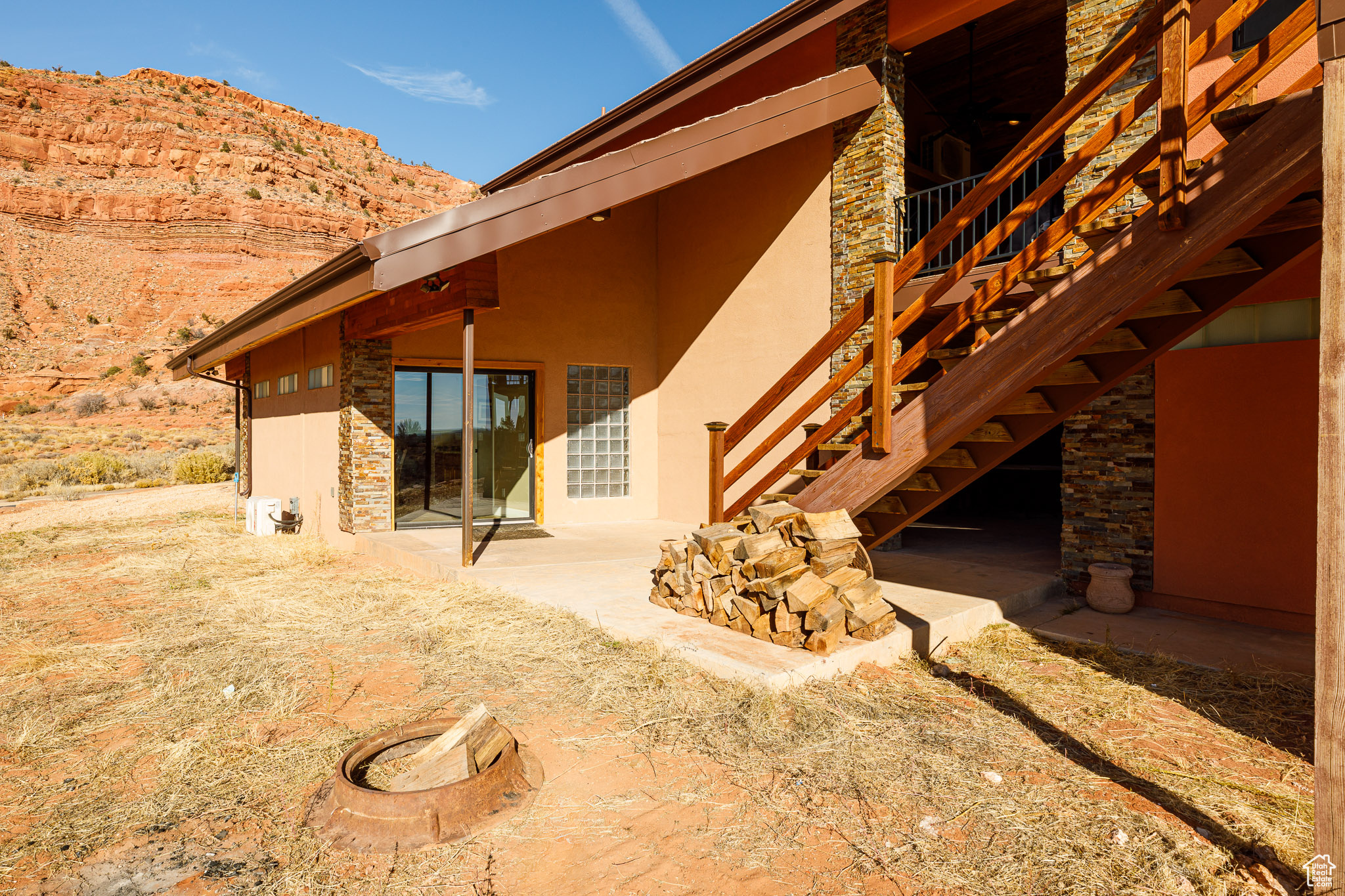 Rear view of house with a patio area