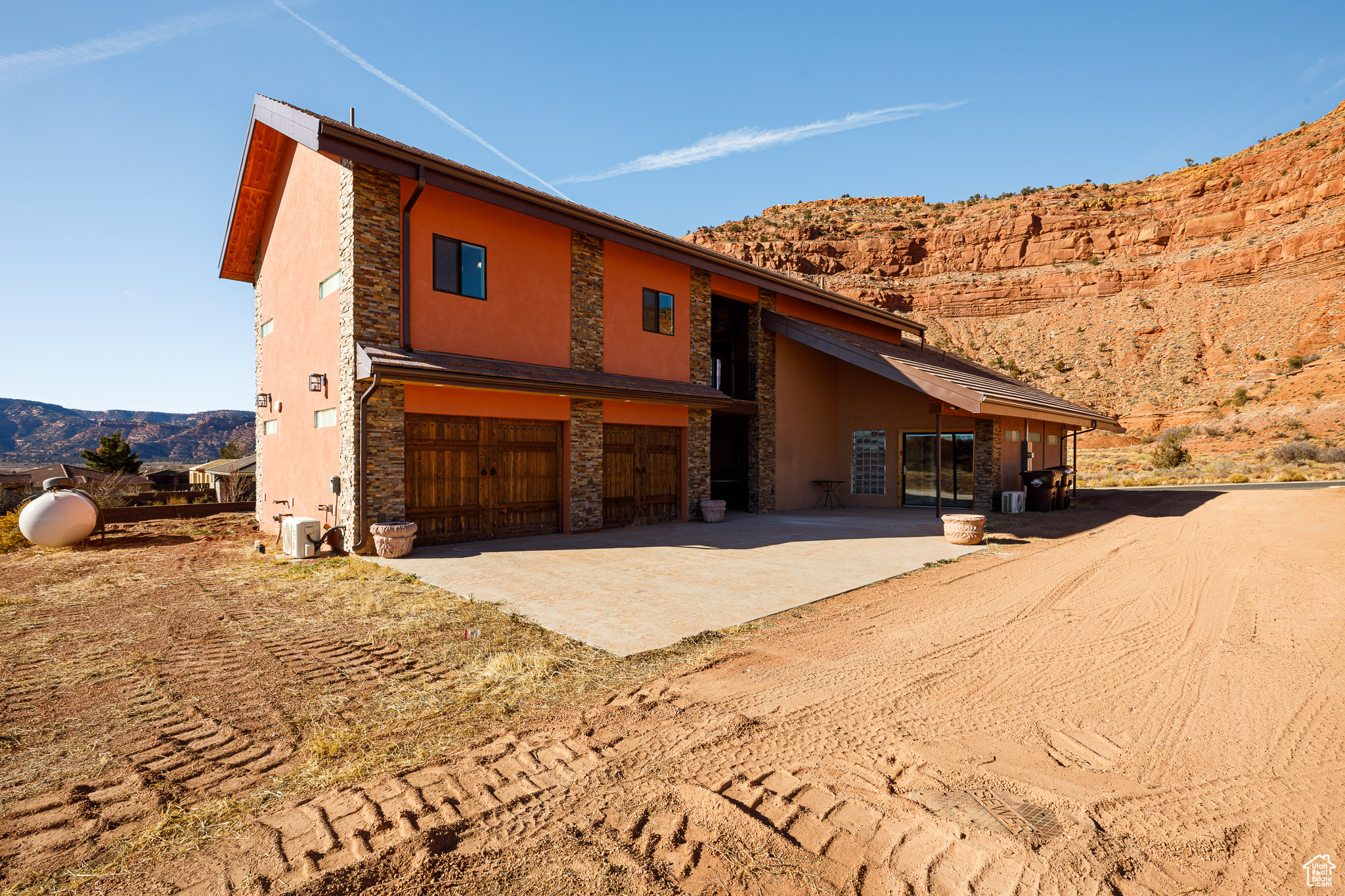 Exterior space featuring a mountain view and a garage