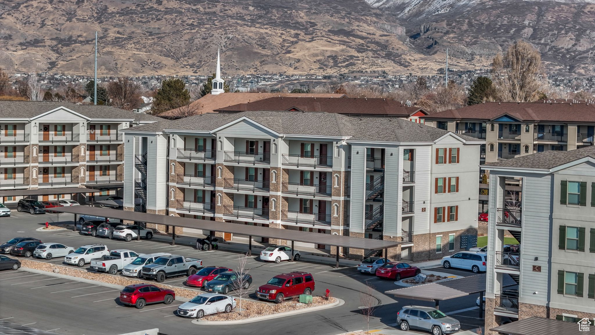 View of building exterior featuring a mountain view