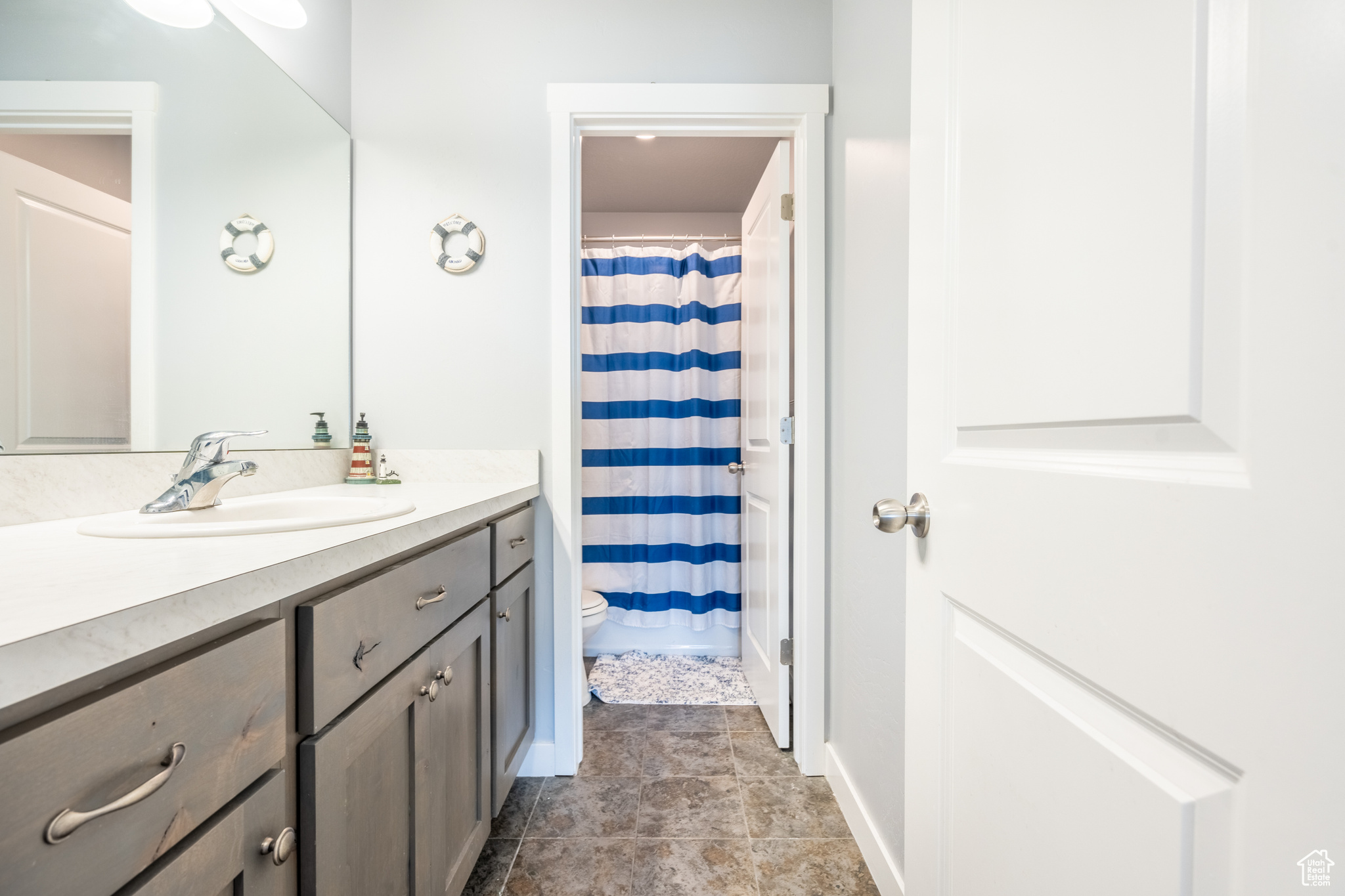 Bathroom with vanity and toilet