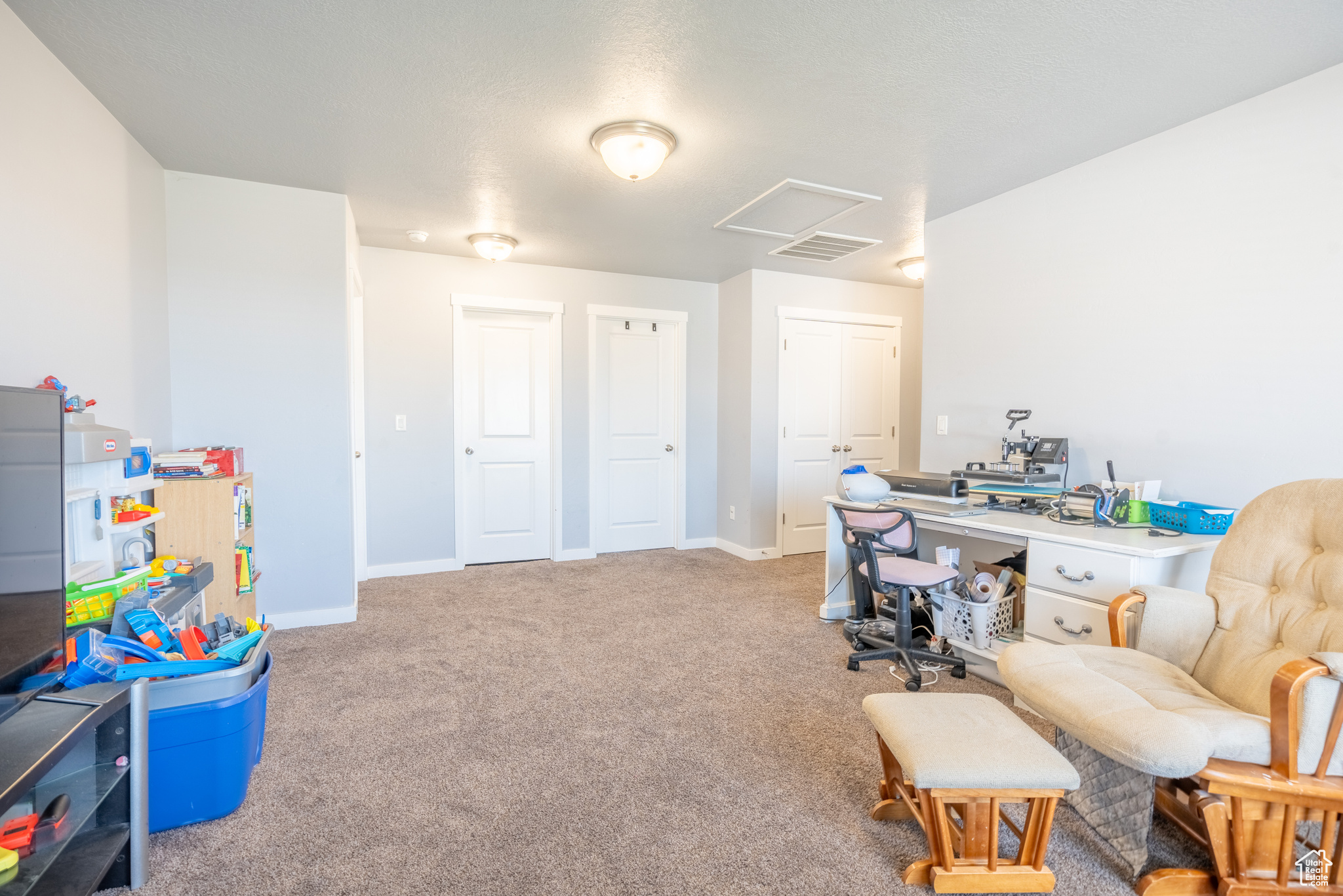 Office area featuring carpet flooring