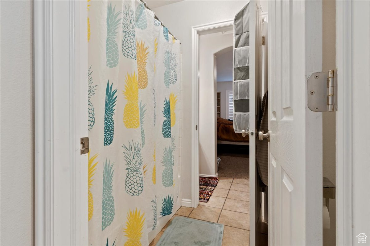 Bathroom featuring tile patterned flooring