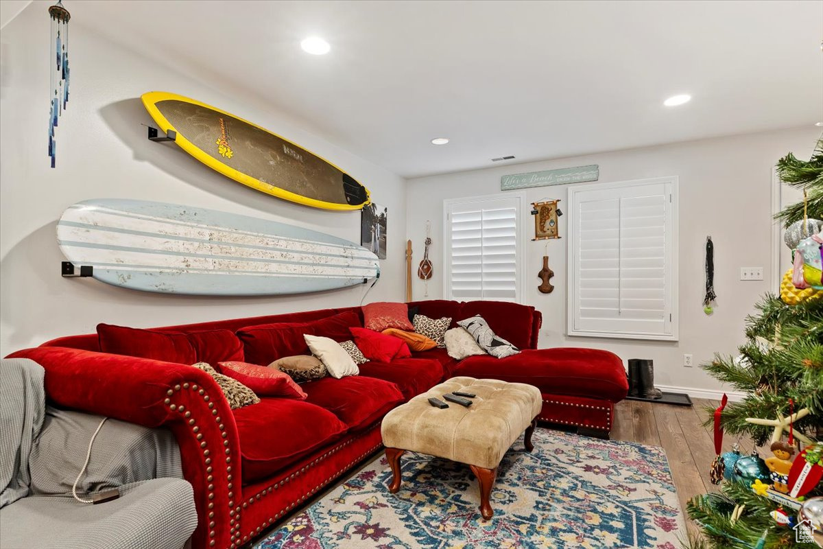 Living room featuring wood-type flooring