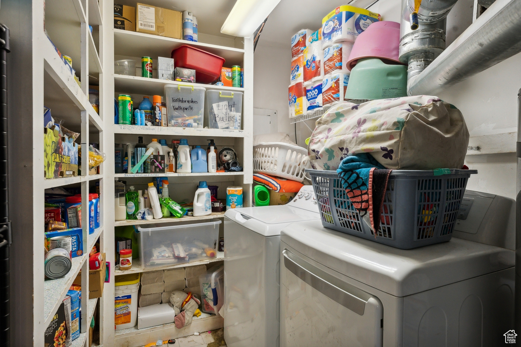 Laundry area with washing machine and clothes dryer