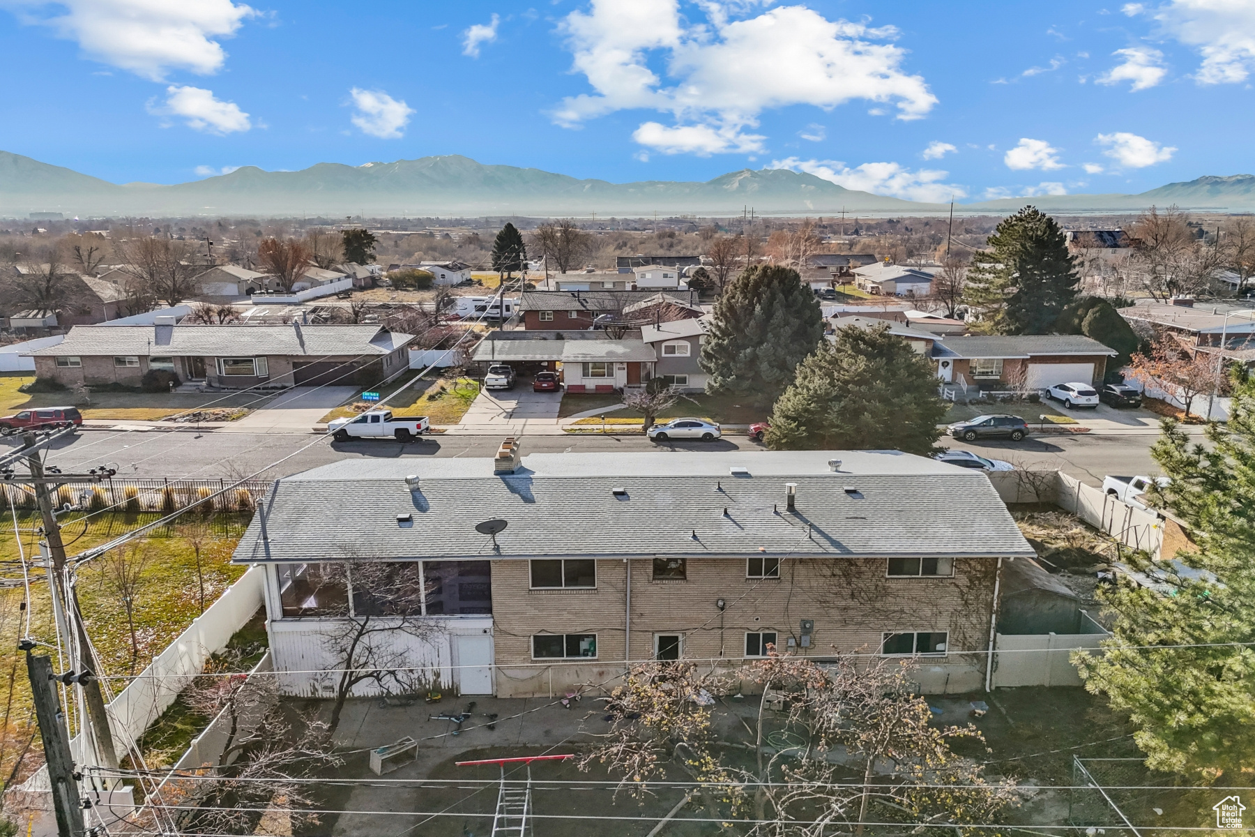 Birds eye view of property with a mountain view