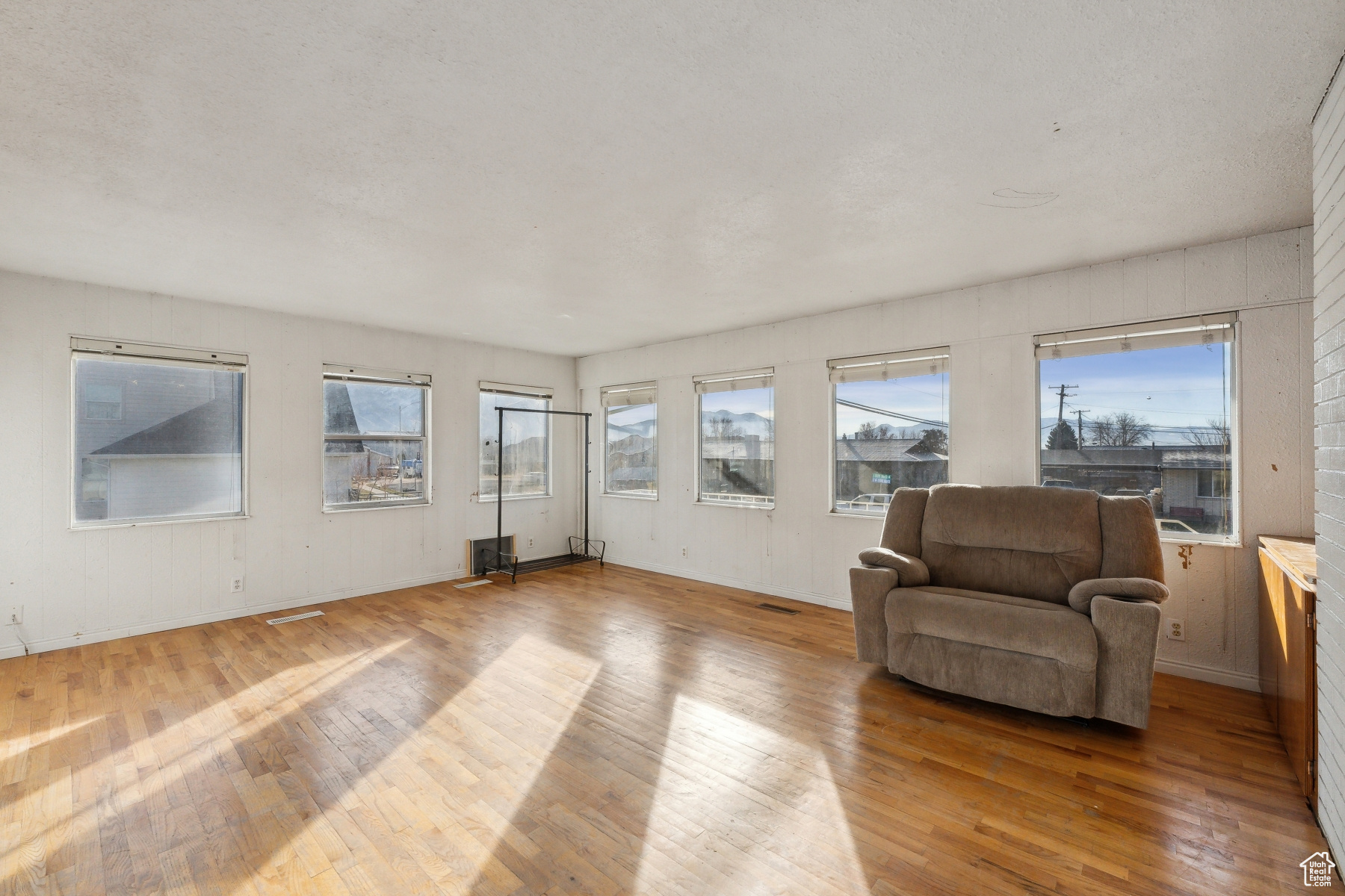 Sitting room featuring hardwood / wood-style flooring