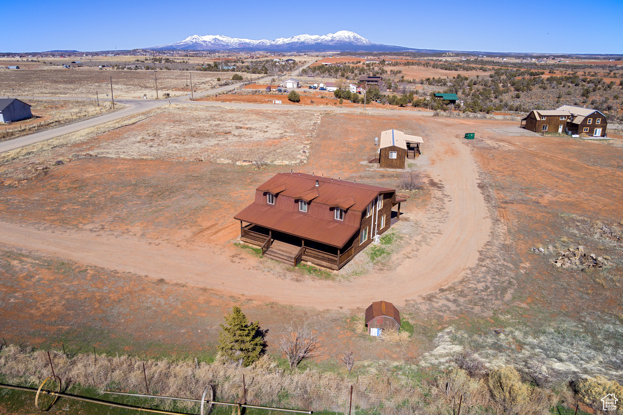 Birds eye view of property featuring a mountain view and a rural view