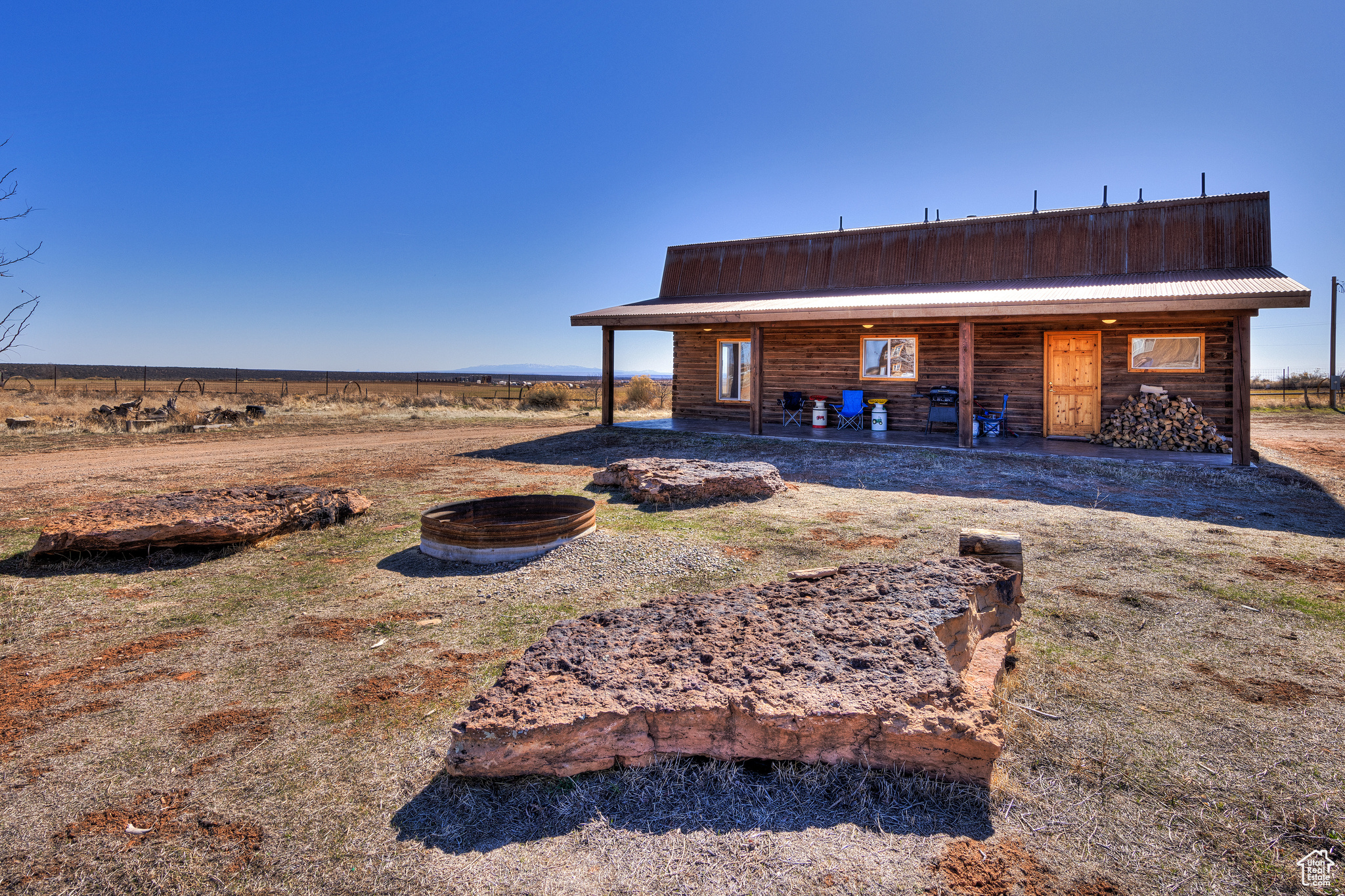 Back of property featuring a rural view