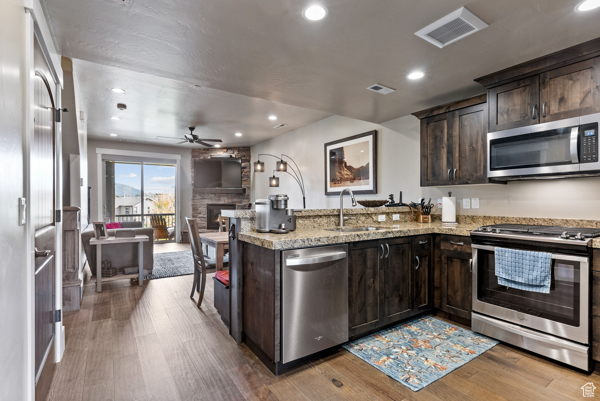 Kitchen featuring sink, kitchen peninsula, and stainless steel appliances