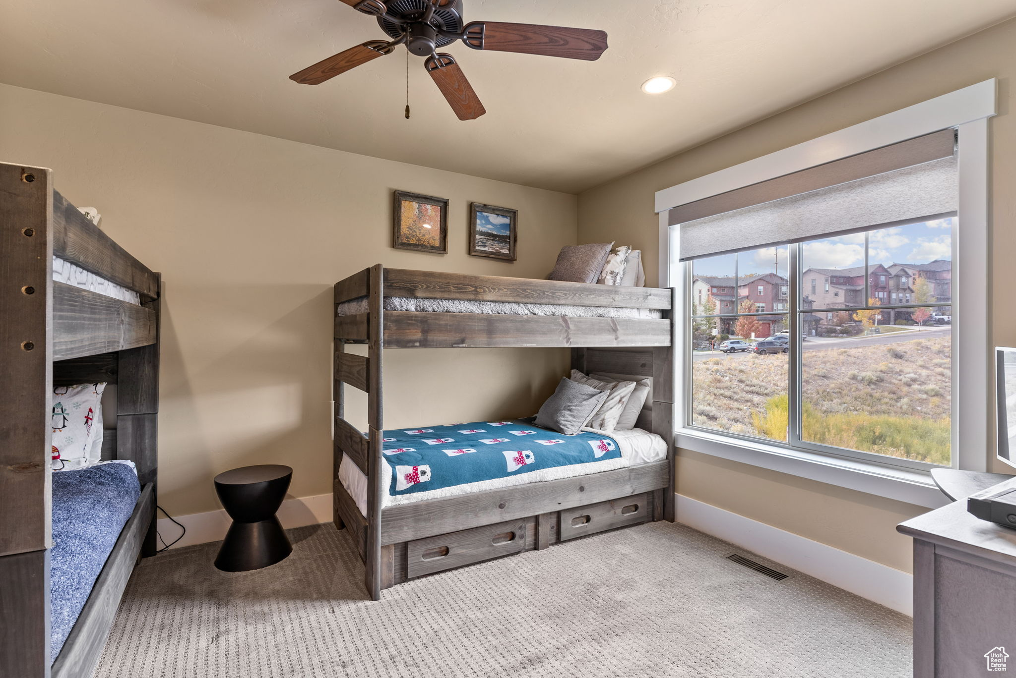 Bedroom with carpet flooring and ceiling fan