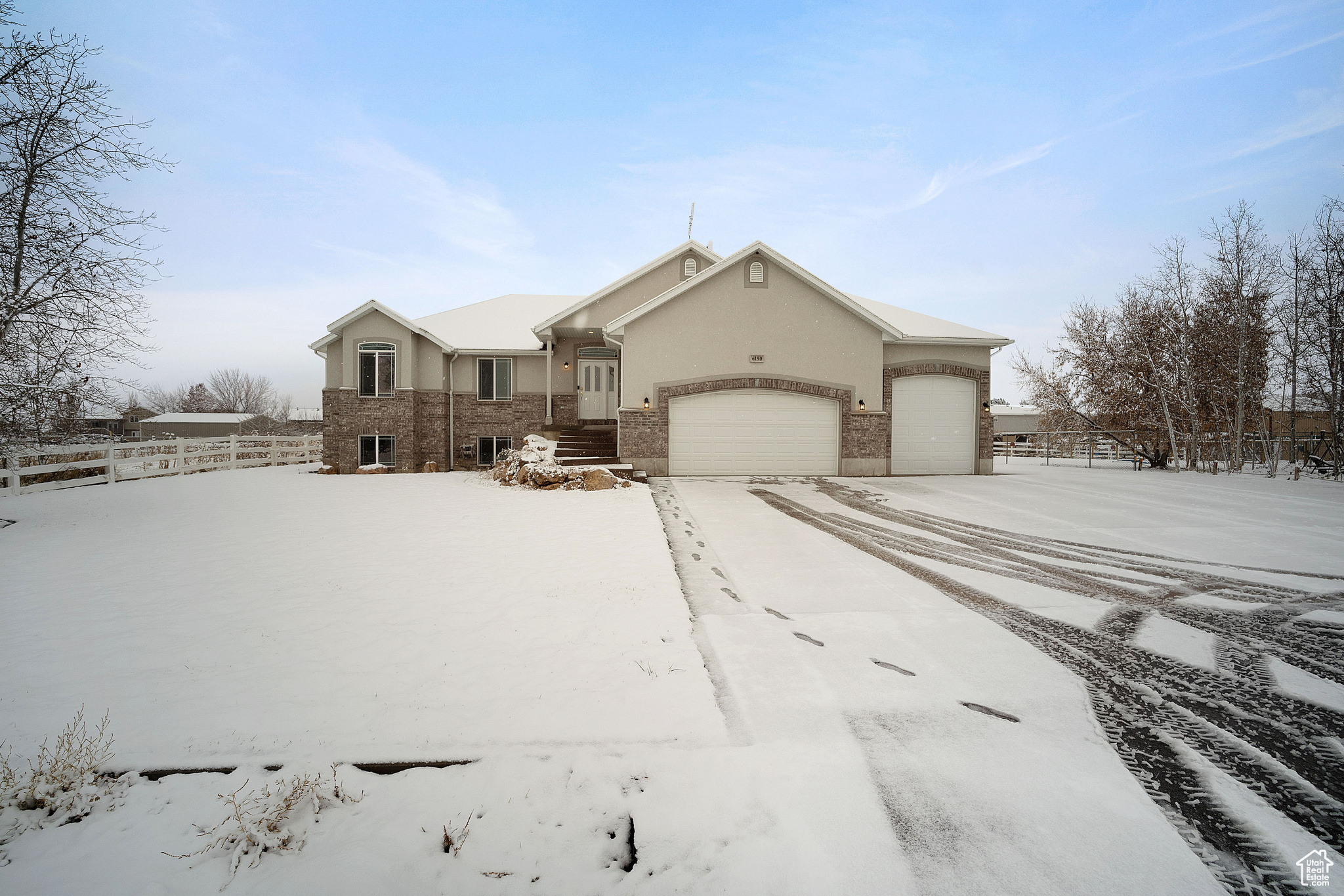 Ranch-style home with a garage