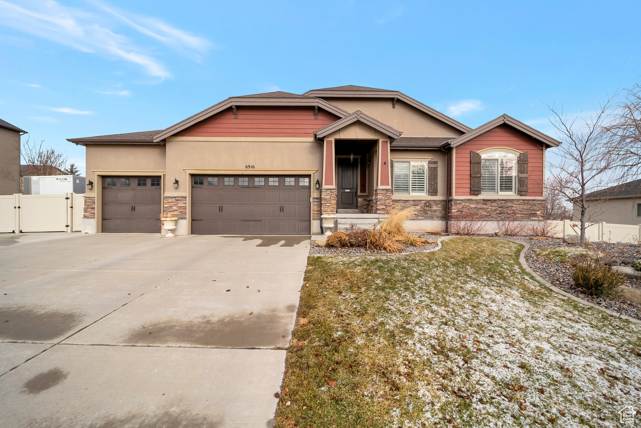 Craftsman-style house featuring a garage