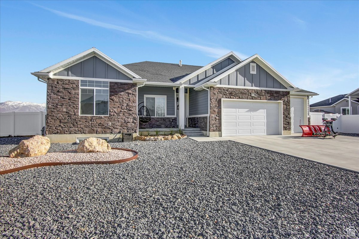 View of front of home featuring a garage