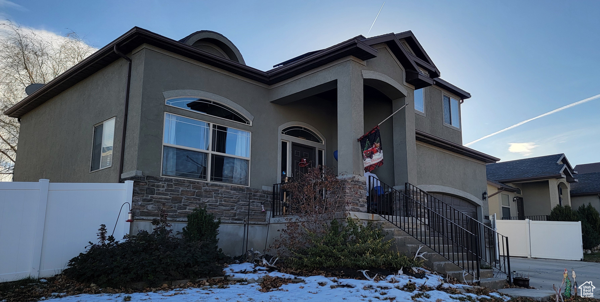 View of front of home featuring a garage