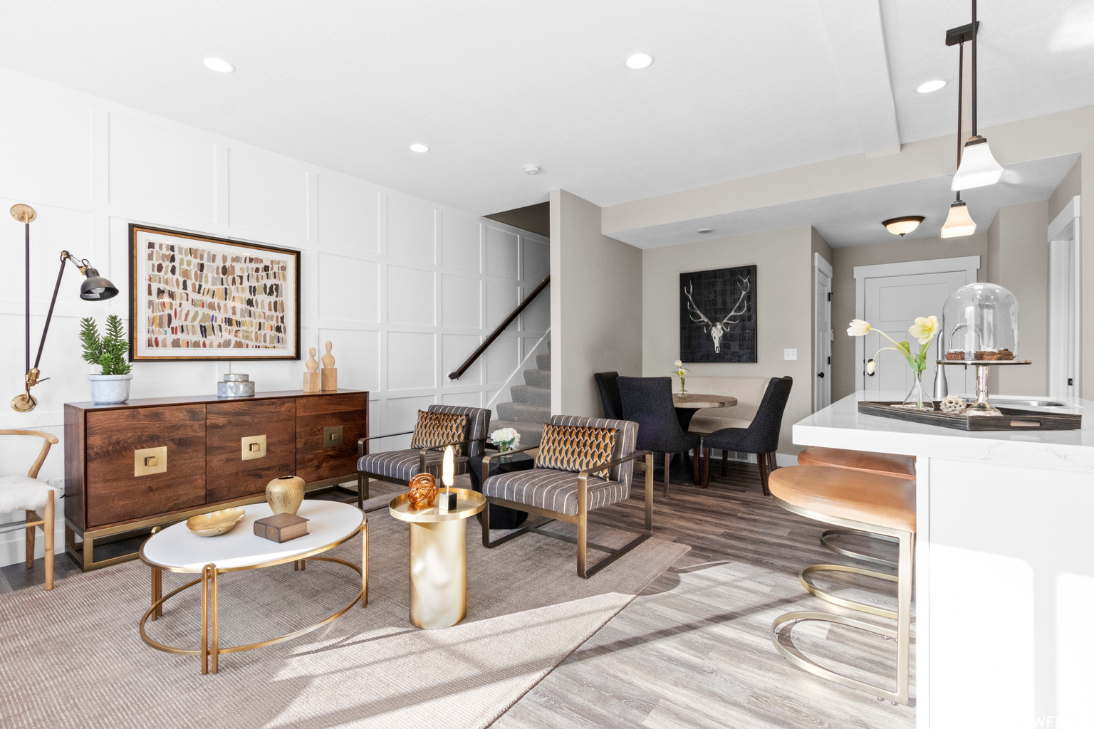 Living room with light hardwood / wood-style floors