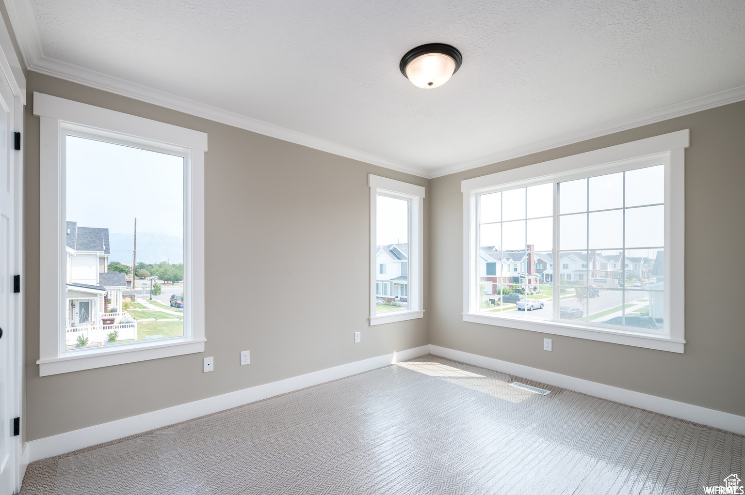 Empty room with crown molding