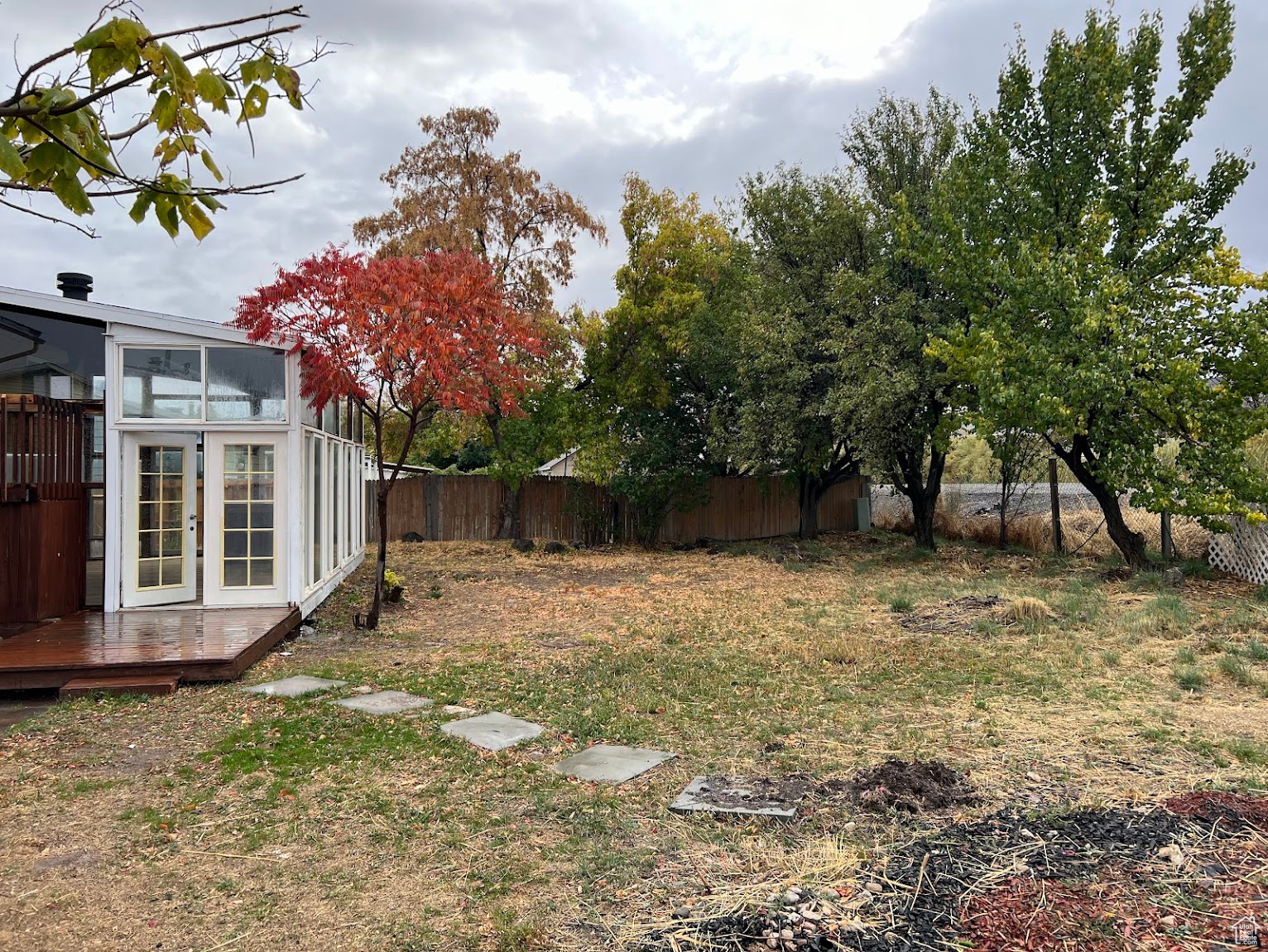 View of yard featuring a deck