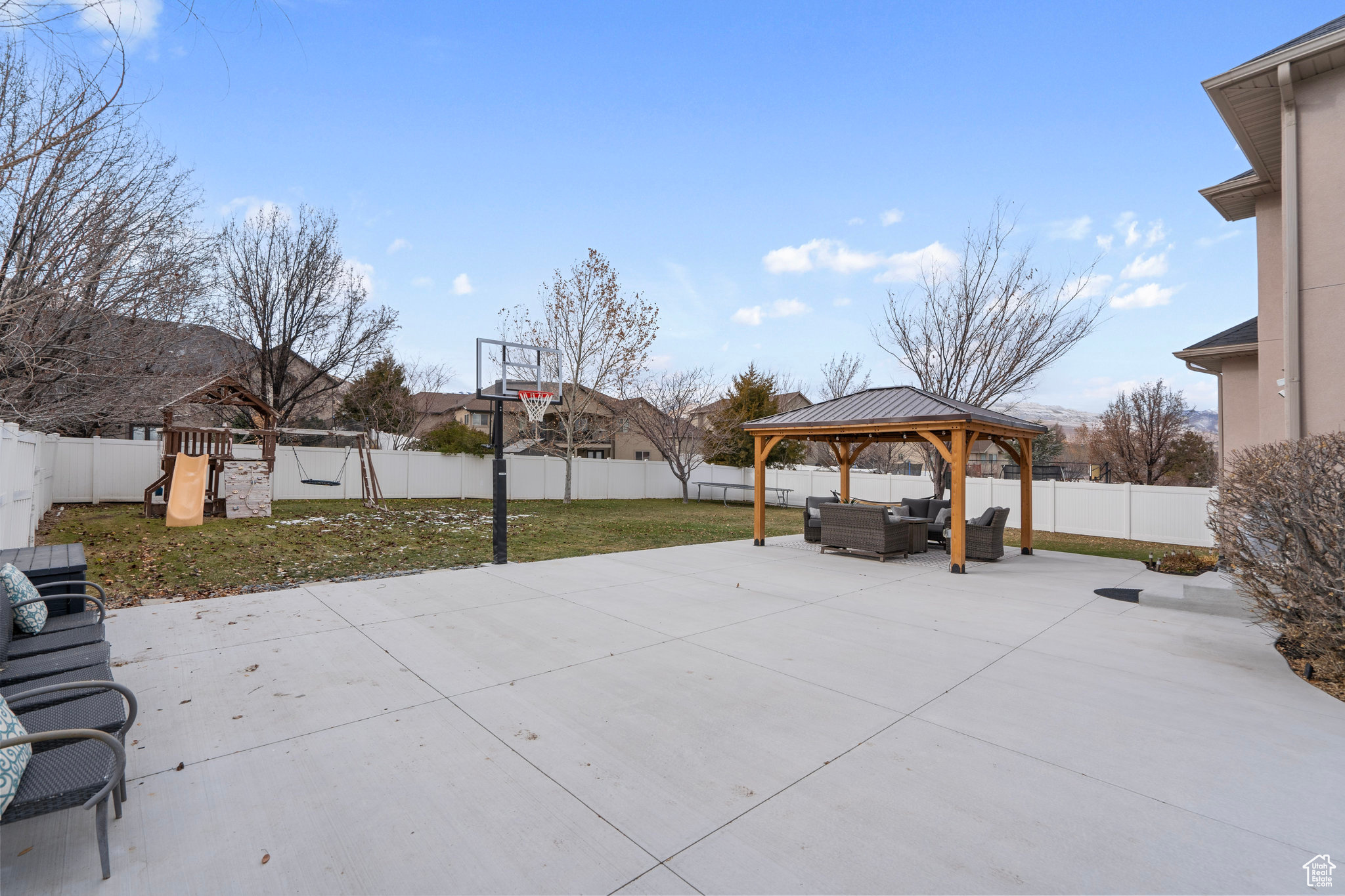 View of patio / terrace featuring a gazebo, a playground, and outdoor lounge area