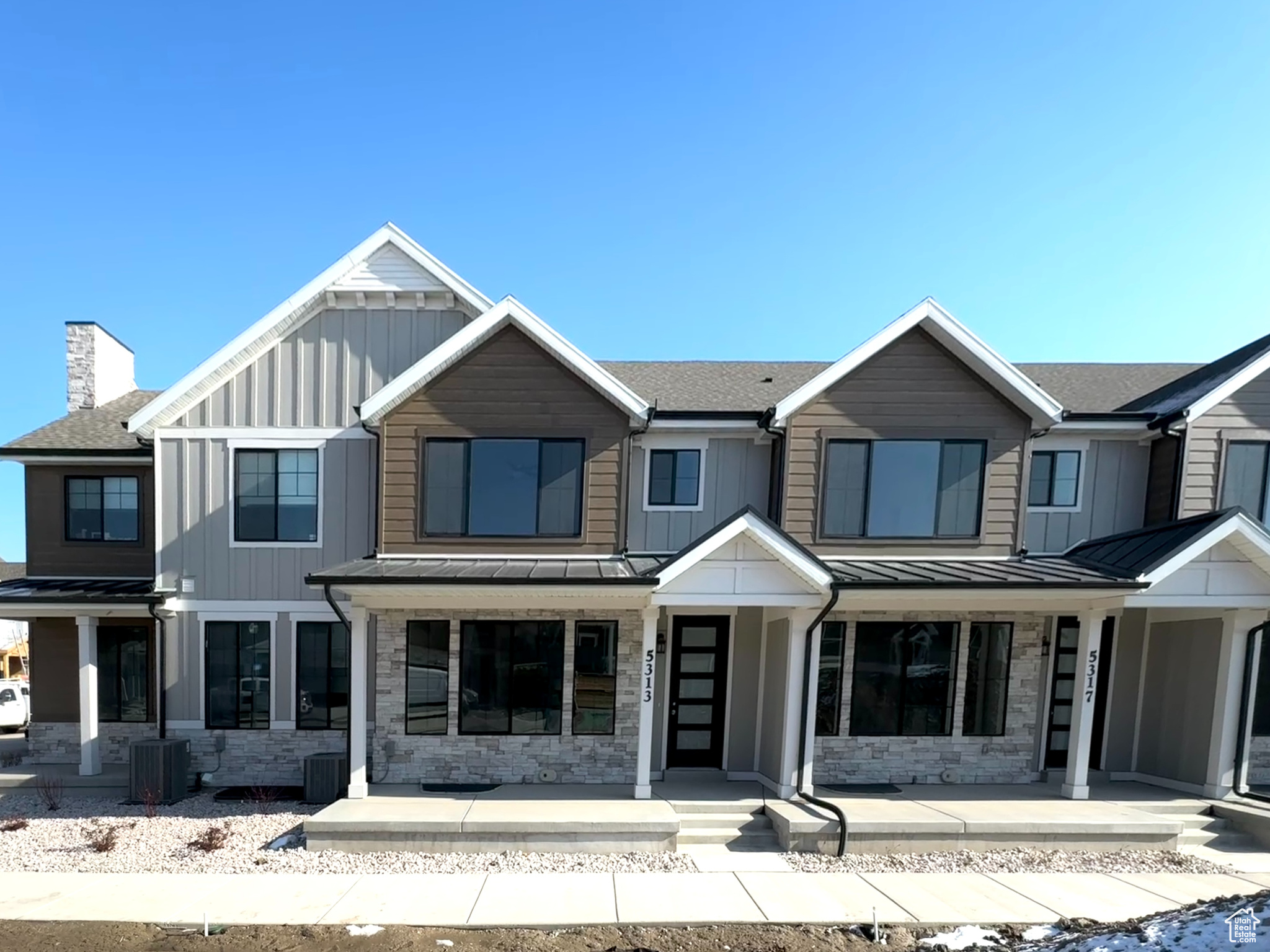 View of front of house with covered porch