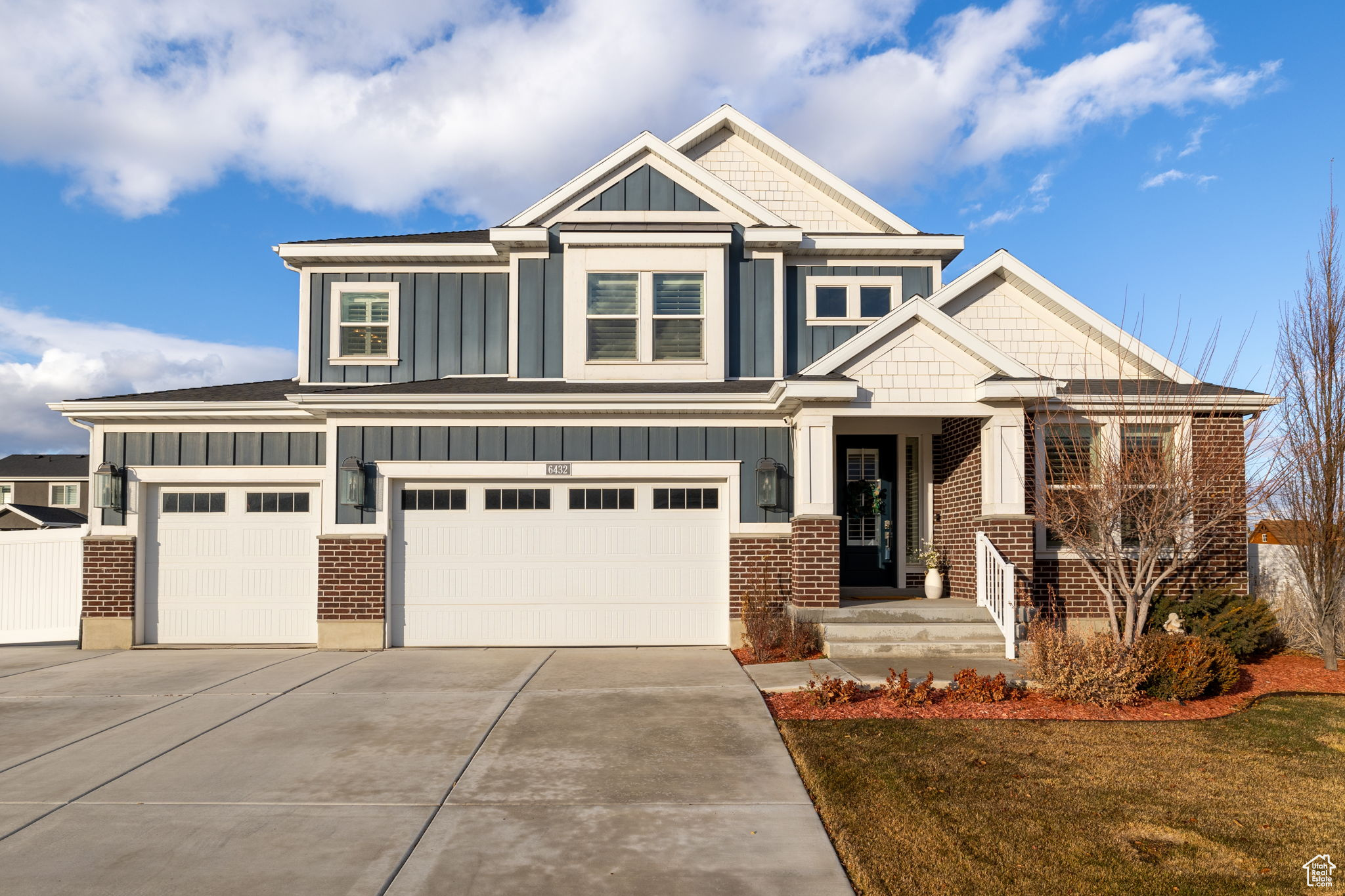 Craftsman-style house featuring a garage