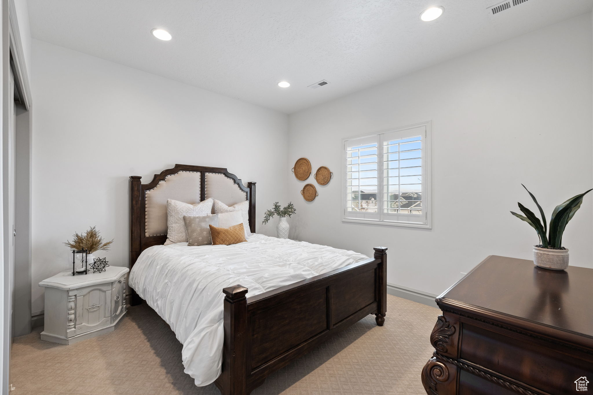 View of carpeted bedroom