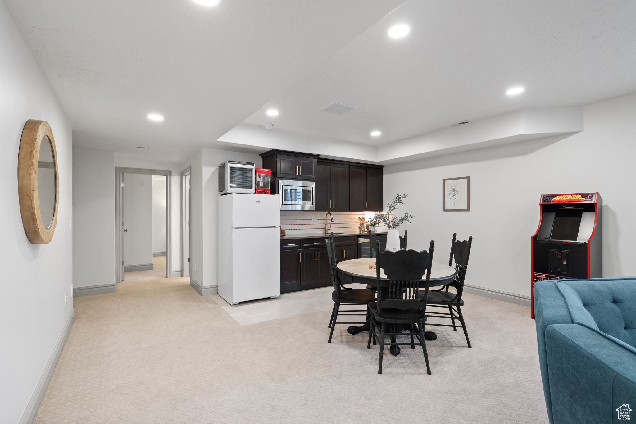 Dining space with light carpet