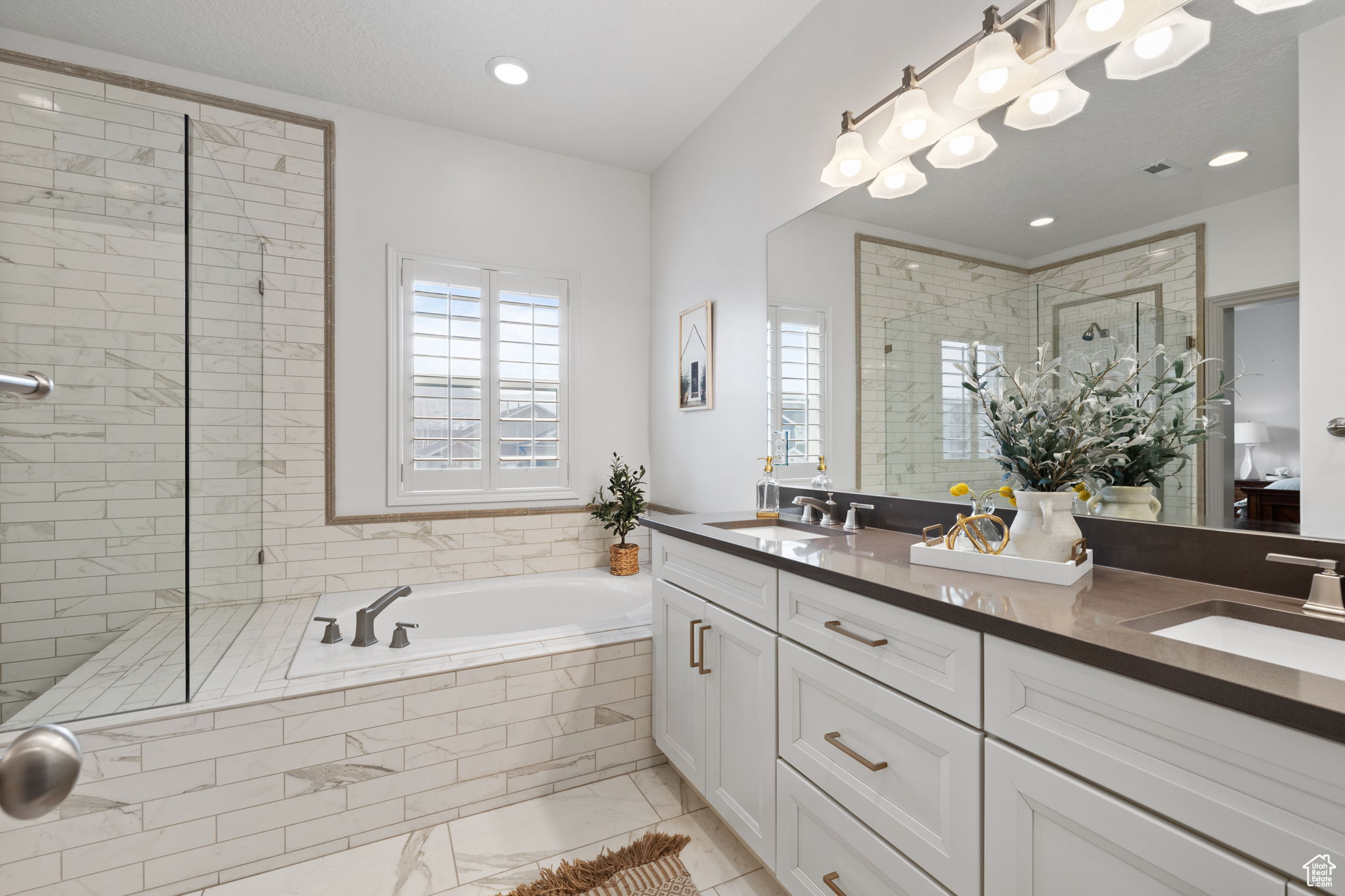 Bathroom with separate shower and tub and vanity