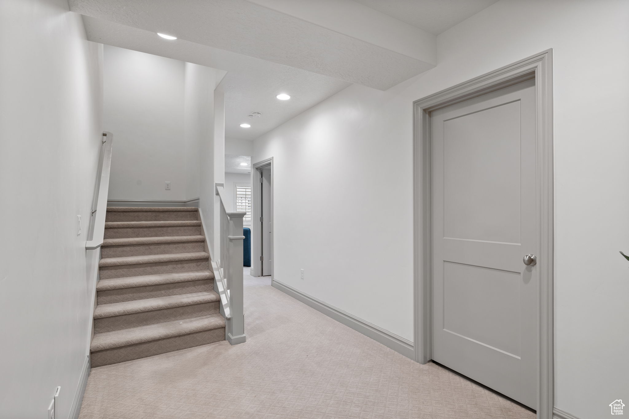 Staircase with carpet floors