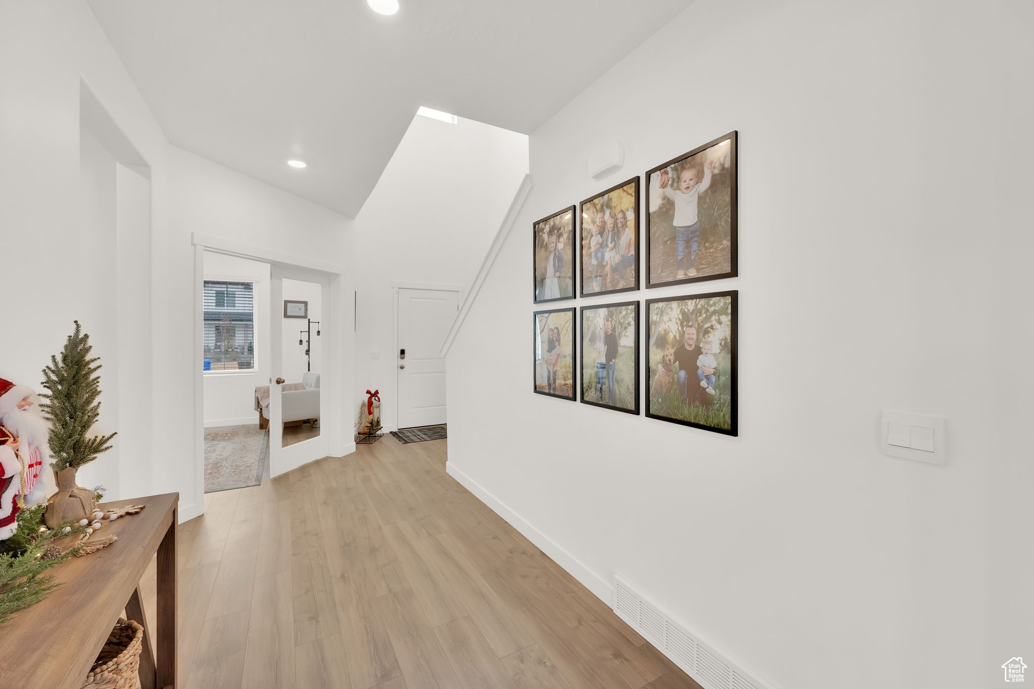 Hall with light wood-type flooring