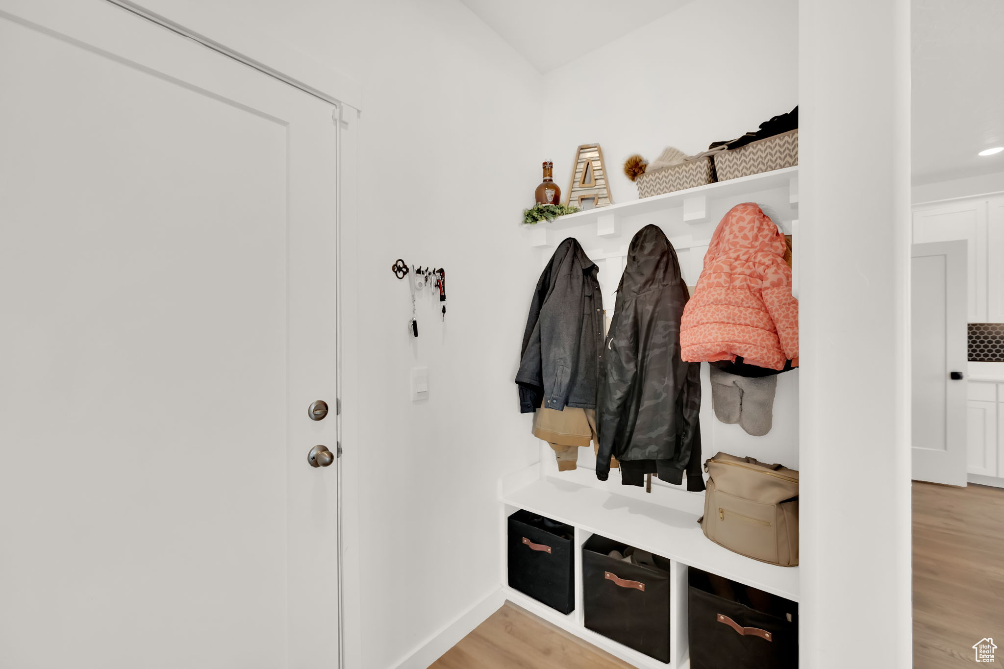 Mudroom featuring light hardwood / wood-style floors