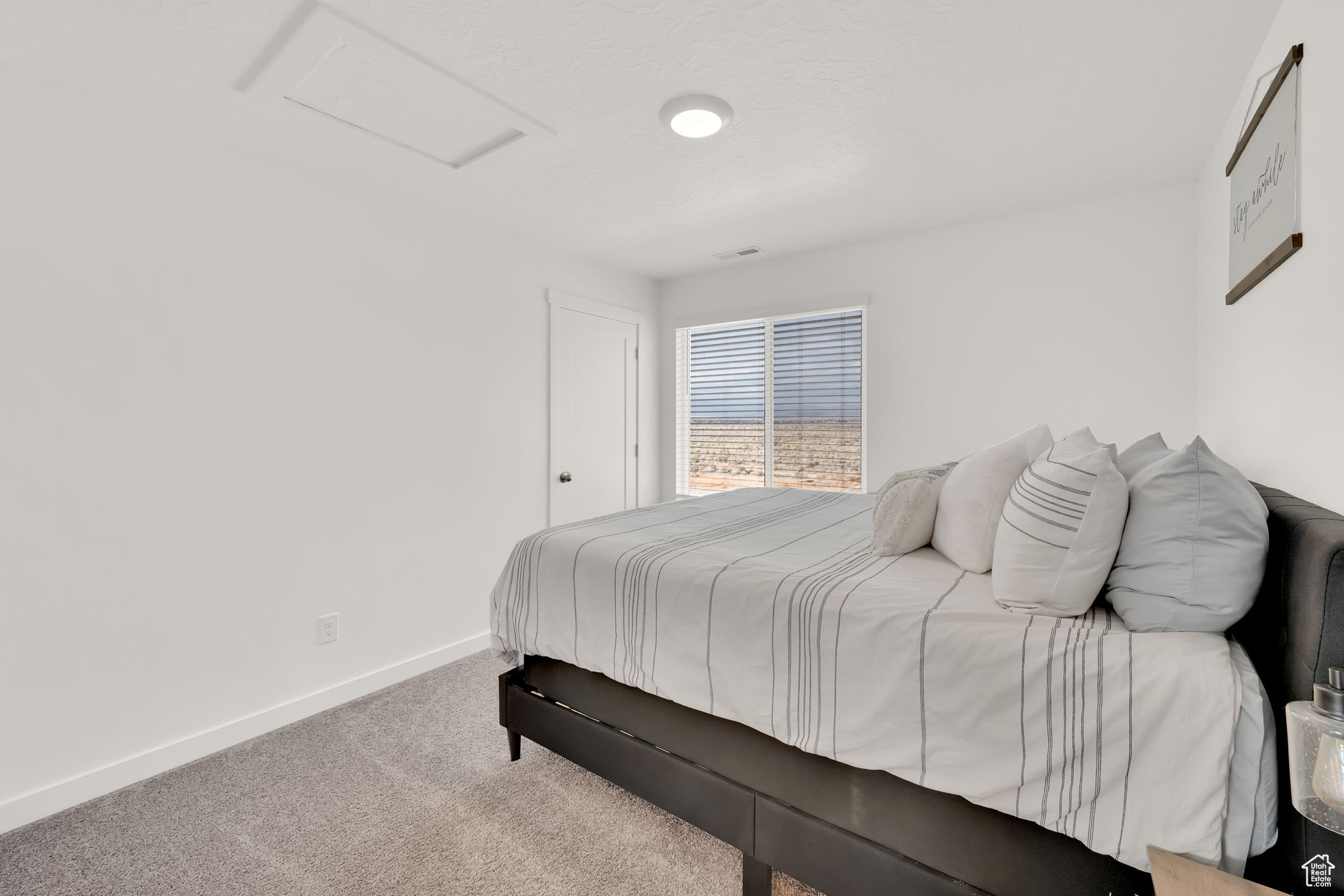 Bedroom with carpet