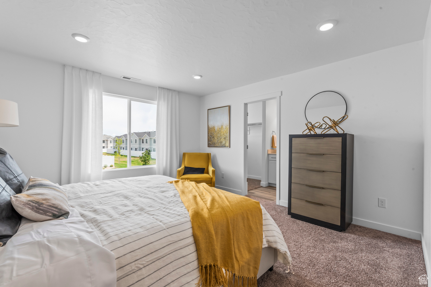 Bedroom featuring carpet flooring