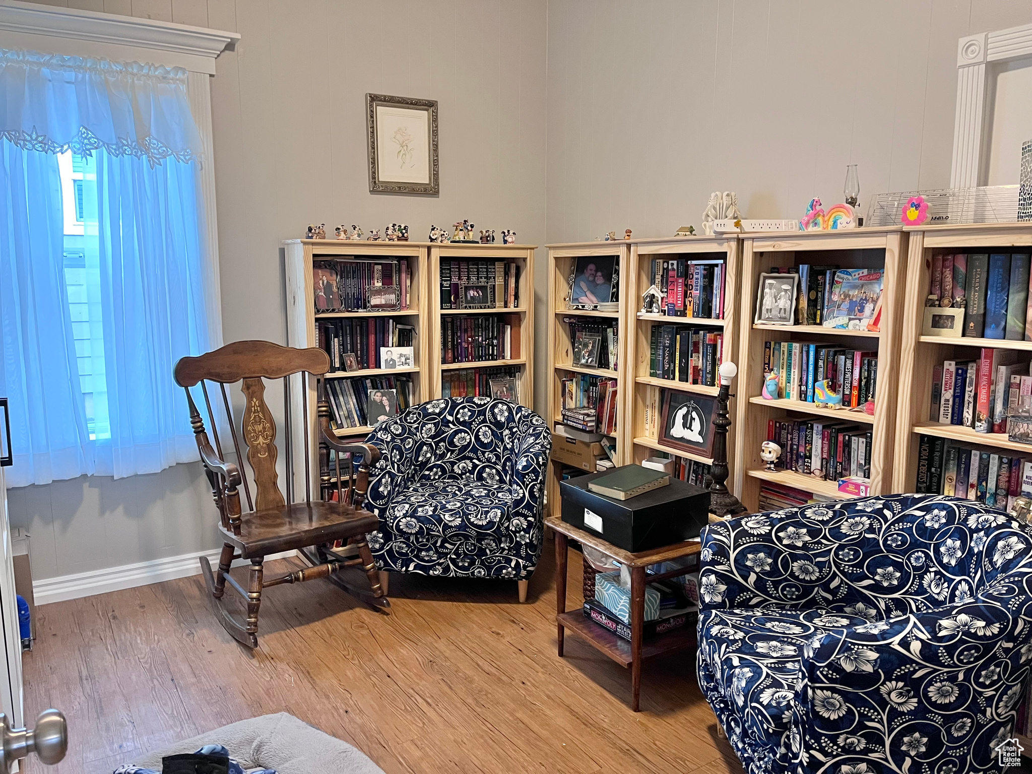 Living area with hardwood / wood-style flooring