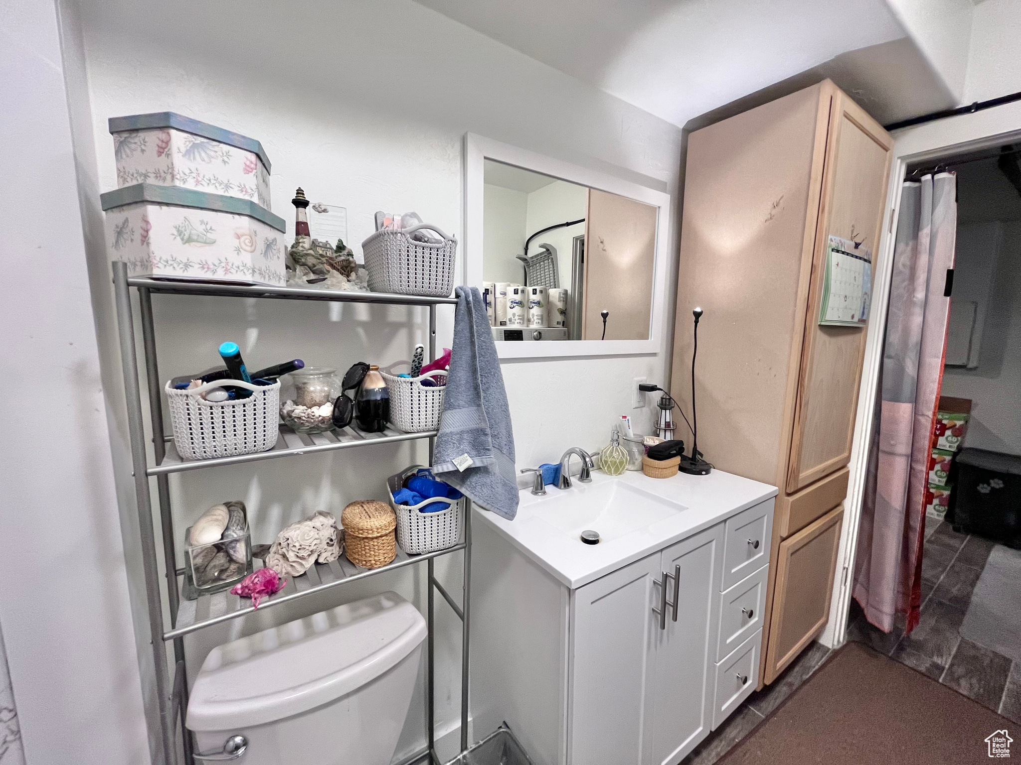 Bathroom with vanity and toilet