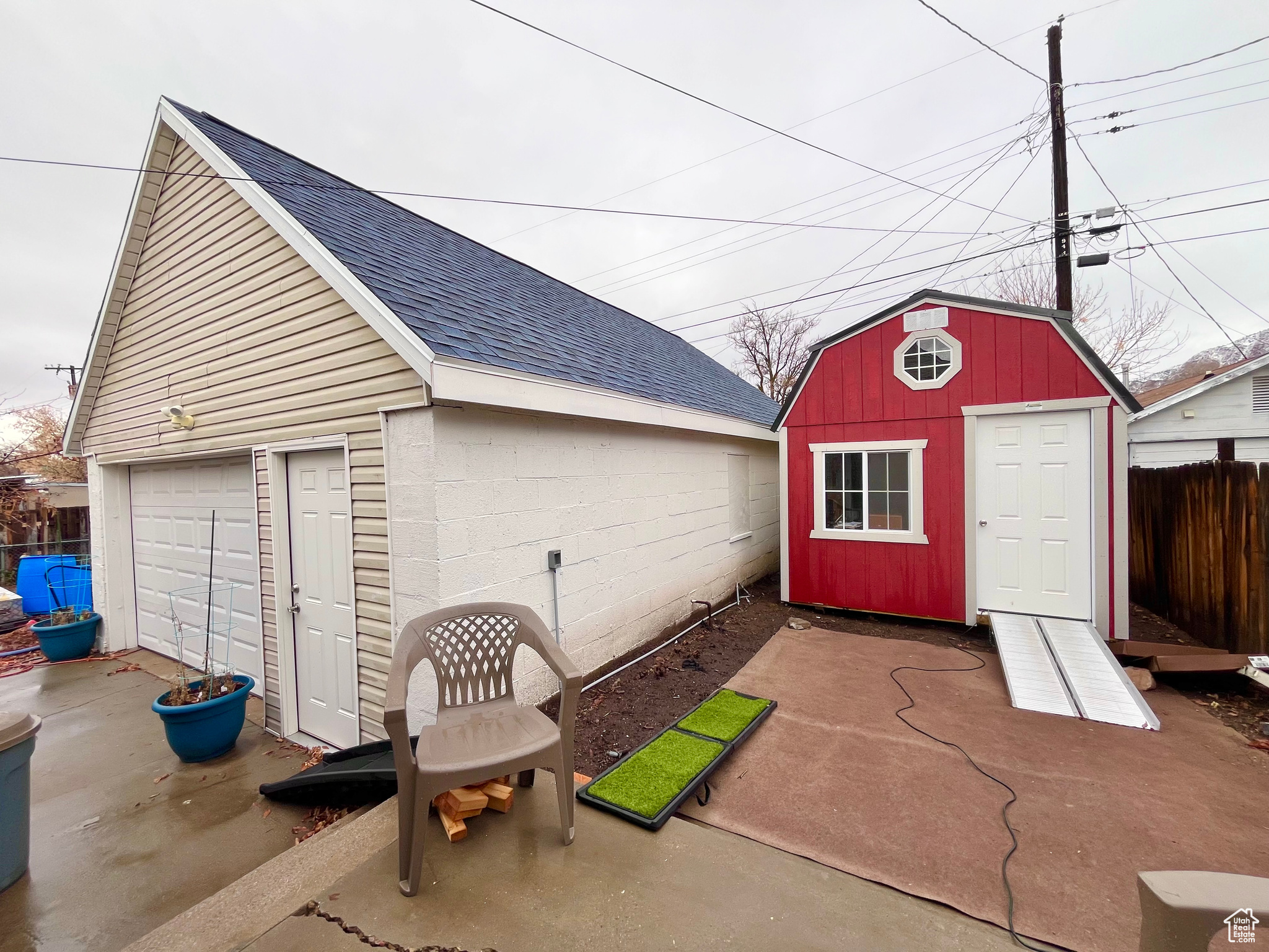 View of outbuilding with a garage