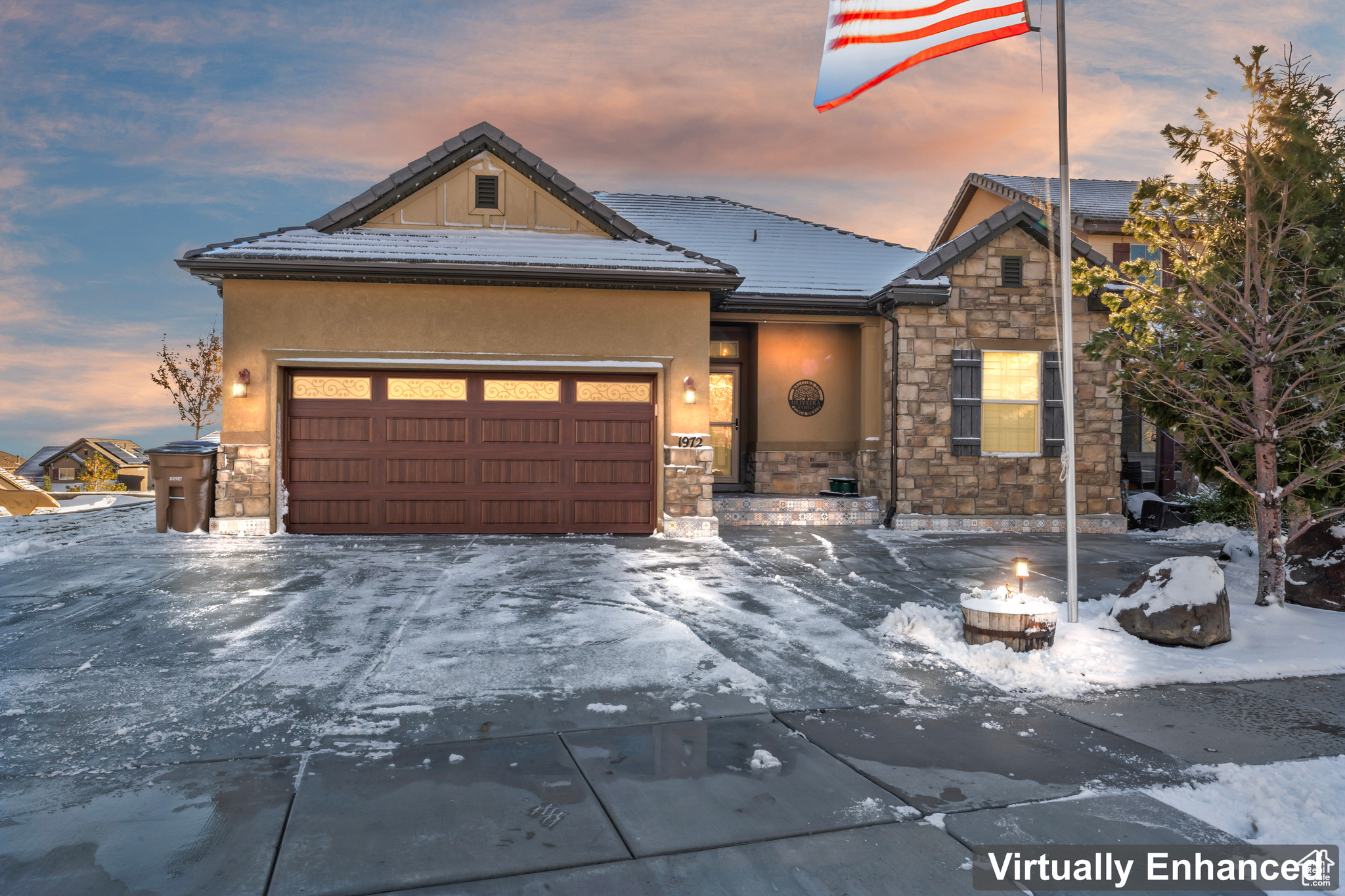 View of front facade featuring a garage