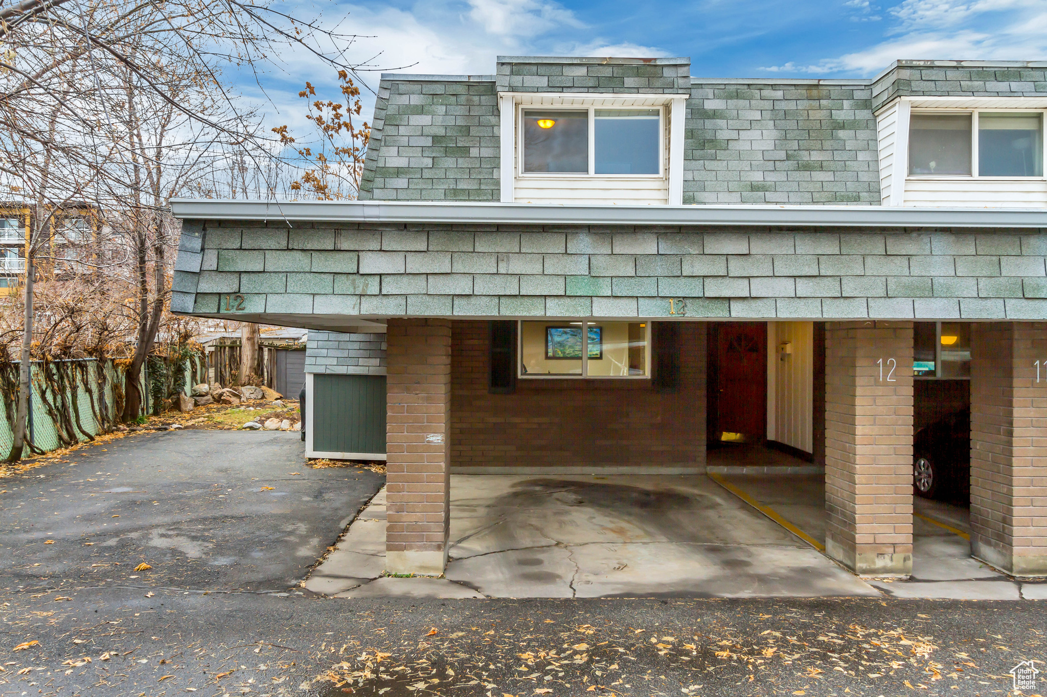 Exterior space featuring a carport