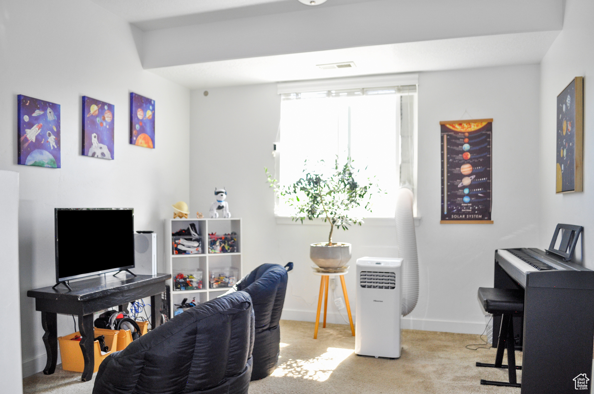 Home office with light carpet