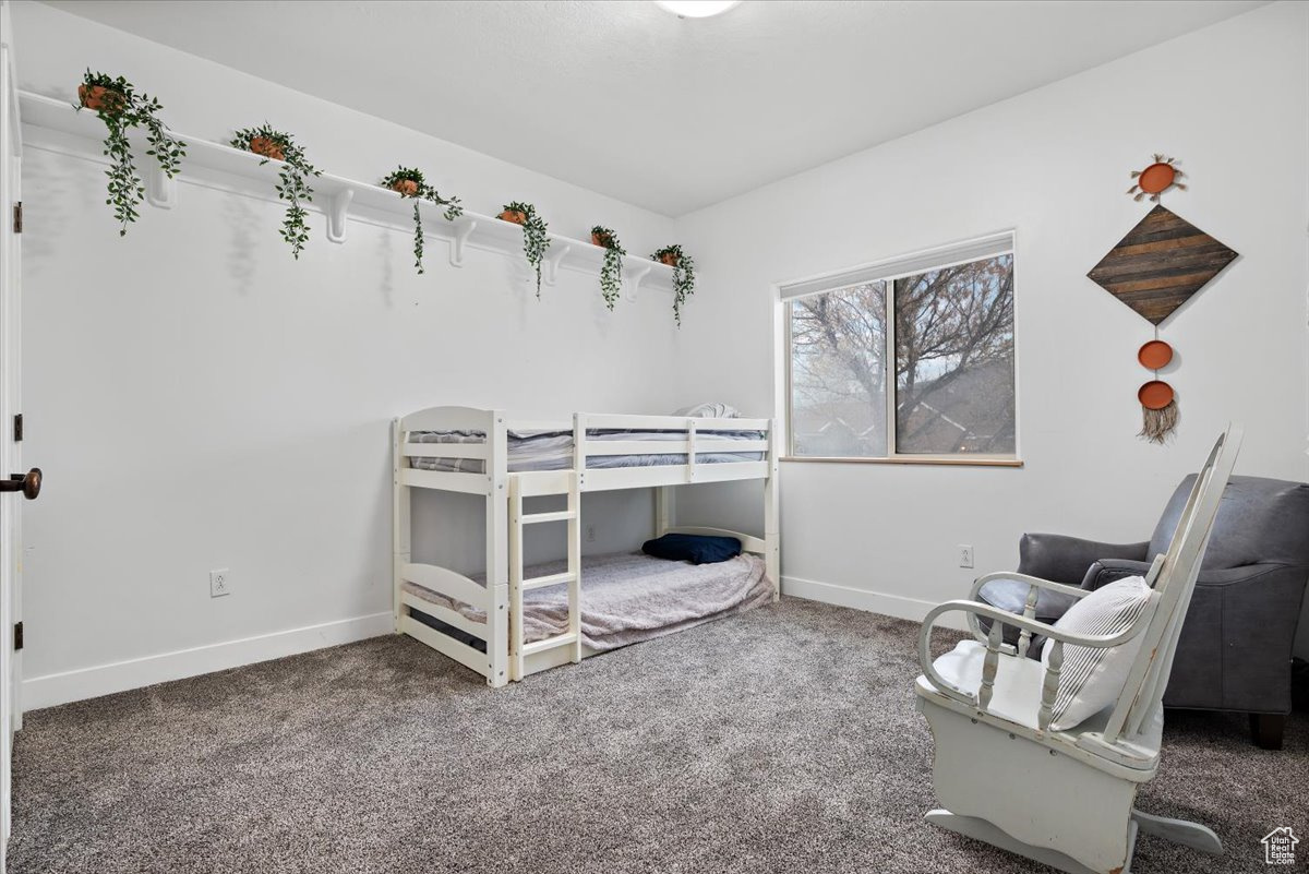 Bedroom with carpet flooring