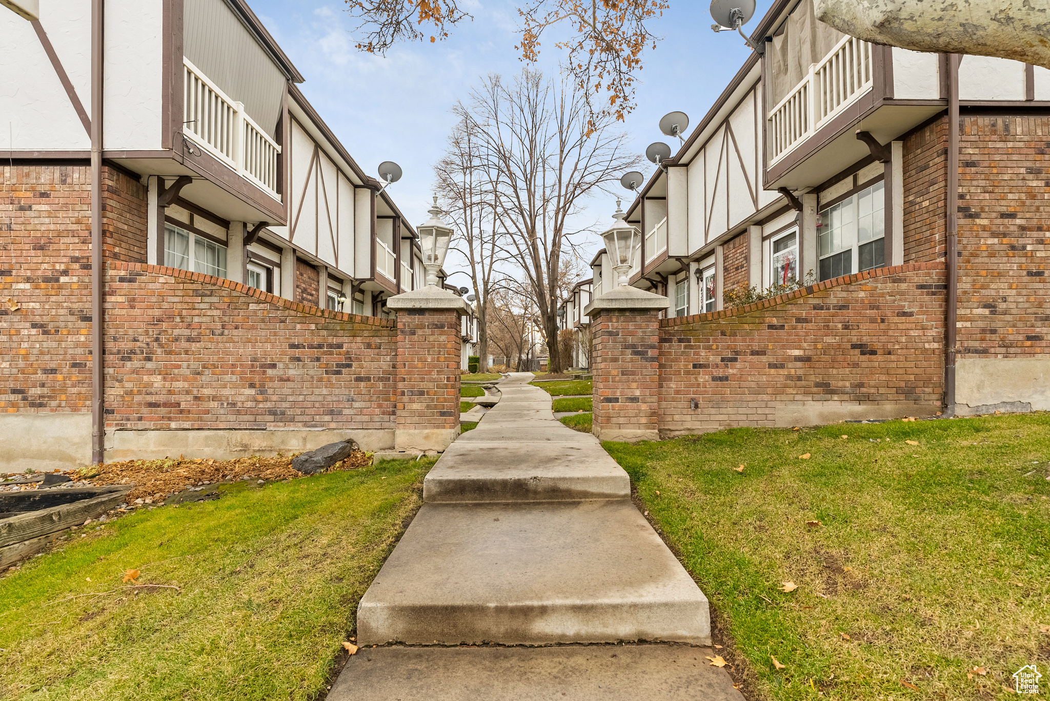 View of community featuring a lawn