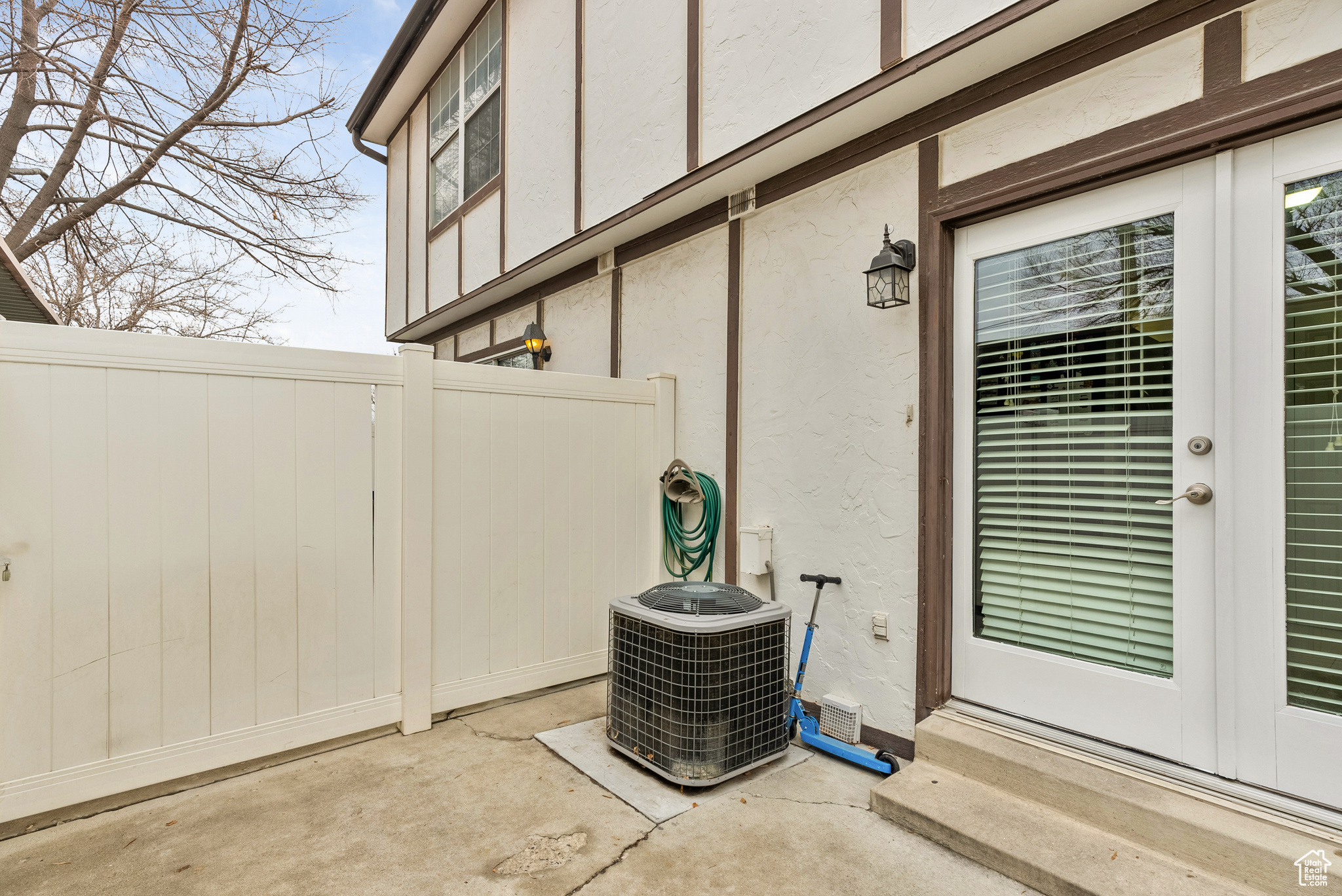 View of patio featuring cooling unit