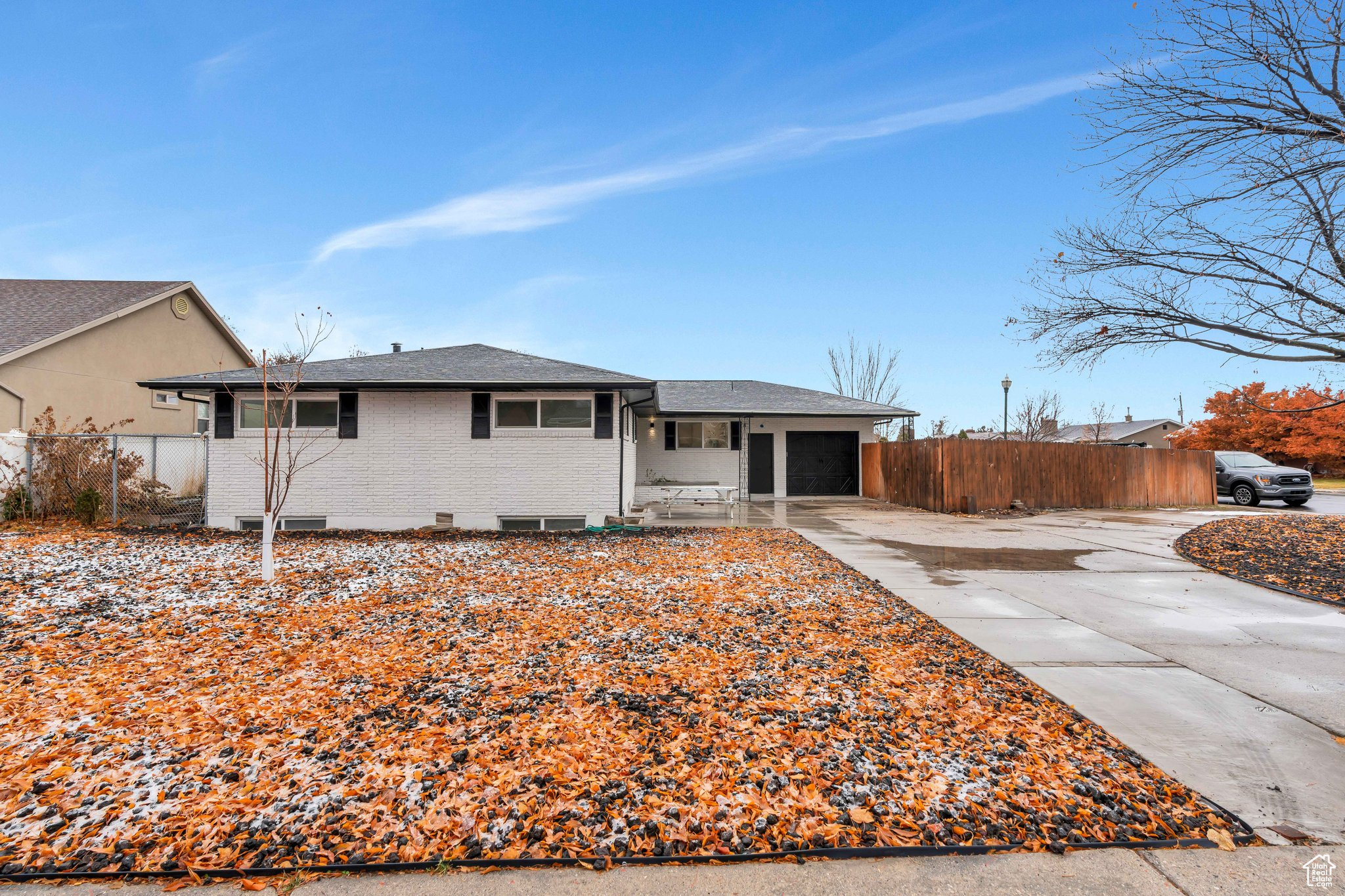 Single story home featuring a garage