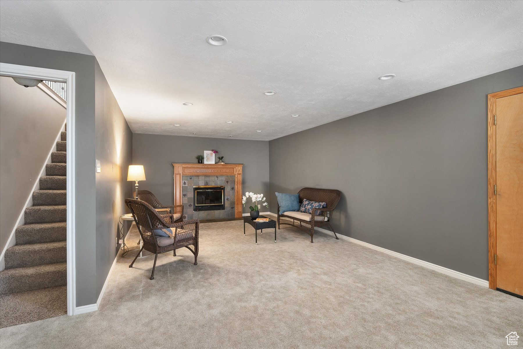 Family room & cozy fireplace with a gas insert