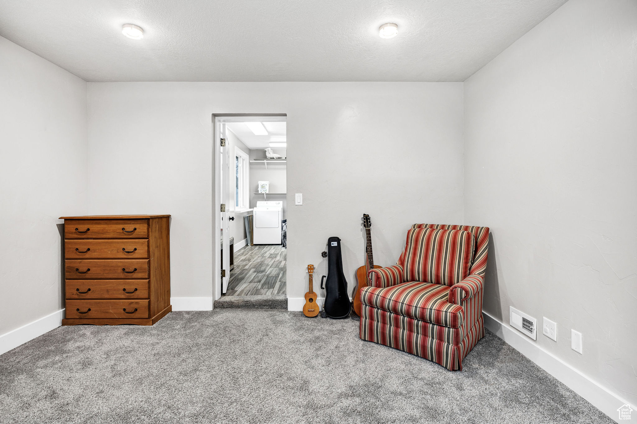 Bedroom featuring carpet flooring.